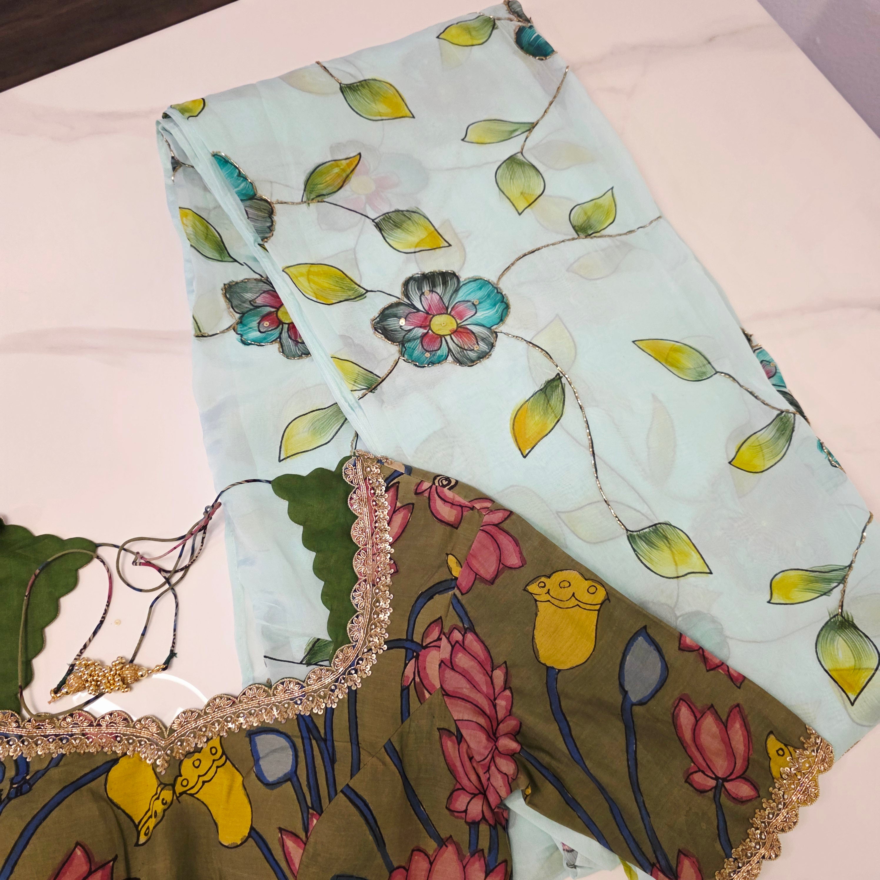 Seagreen Handpainted Viscious organza saree with Kalamkari Maggam blouse