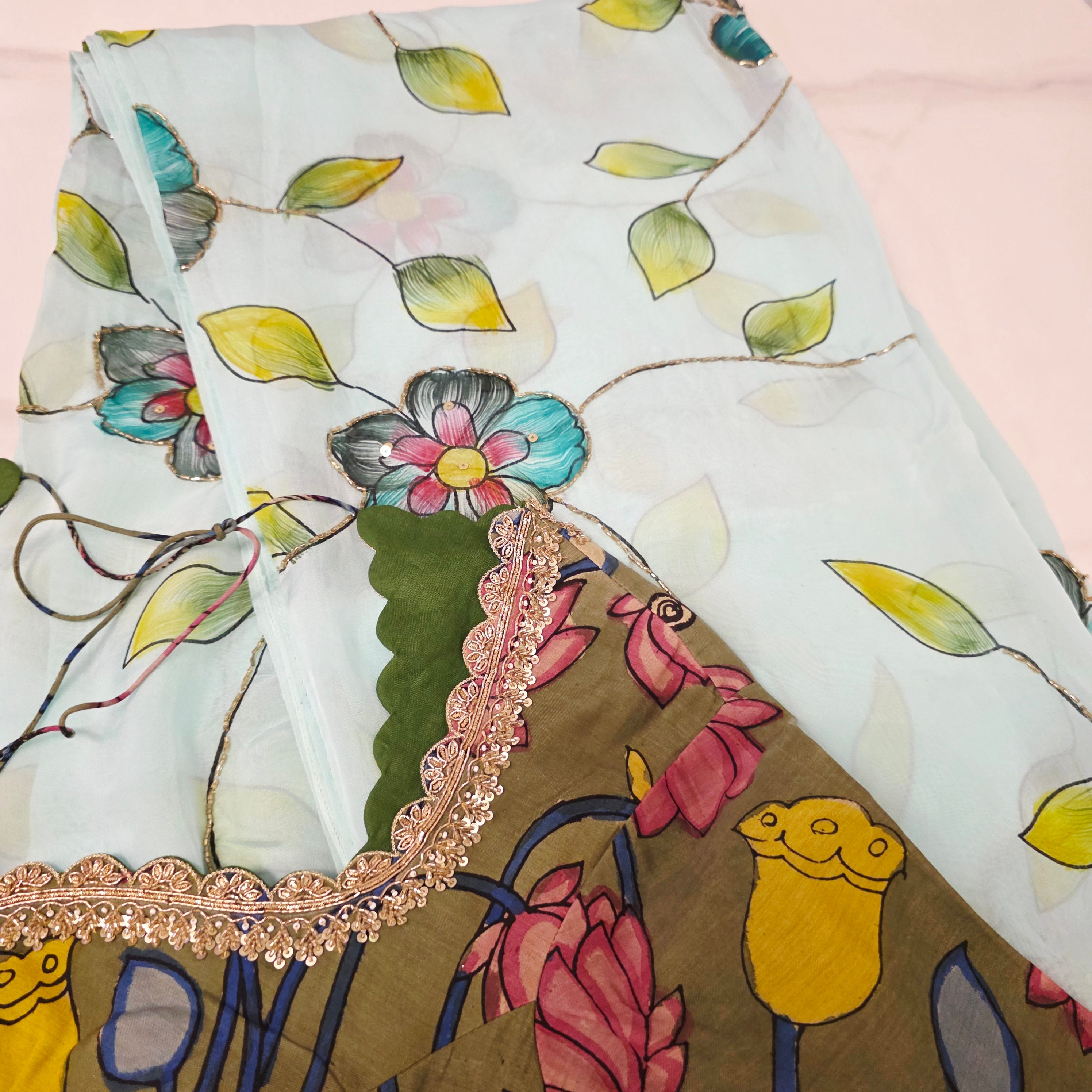 Seagreen Handpainted Viscious organza saree with Kalamkari Maggam blouse