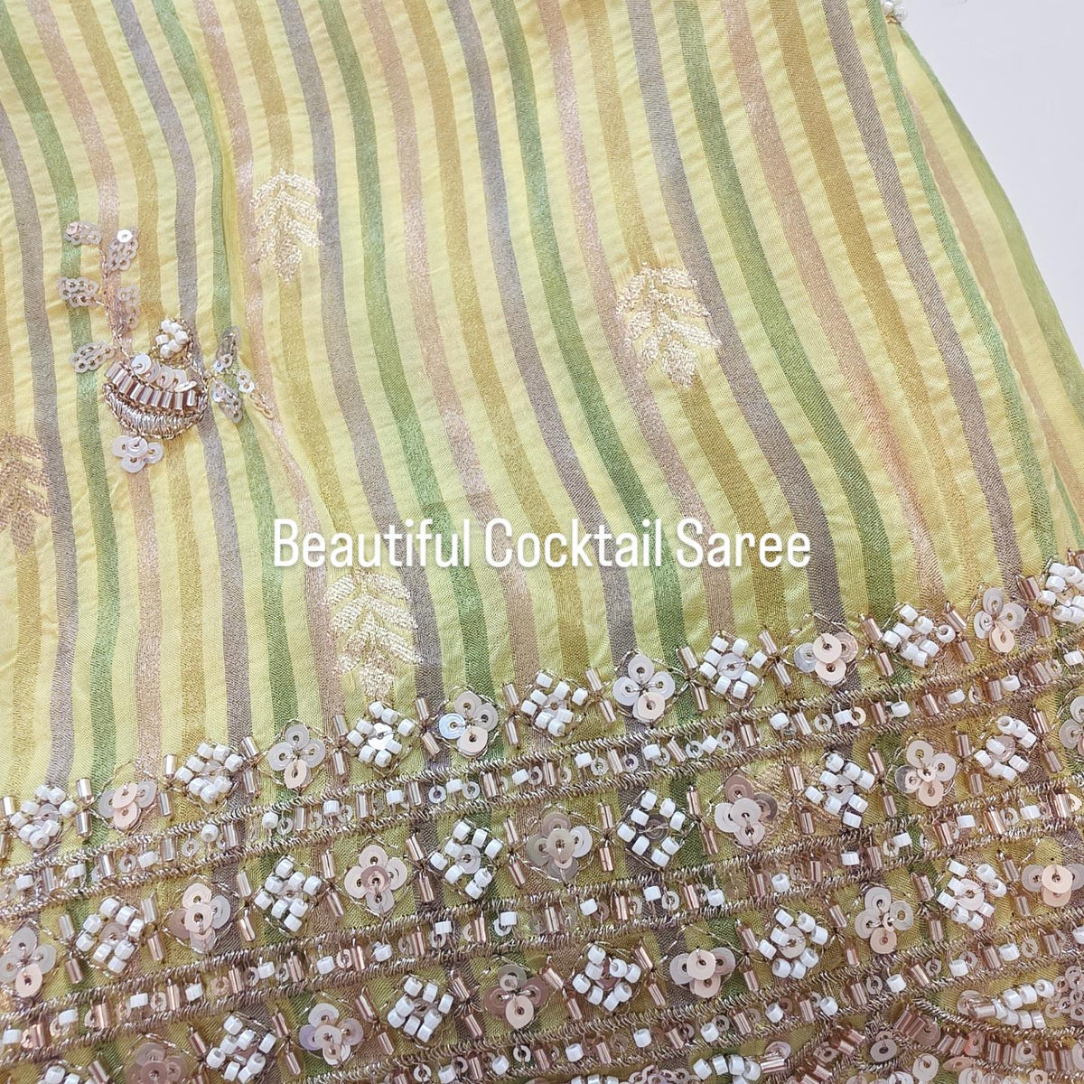 Womens yellow cocktail saree with sabhyasachi border