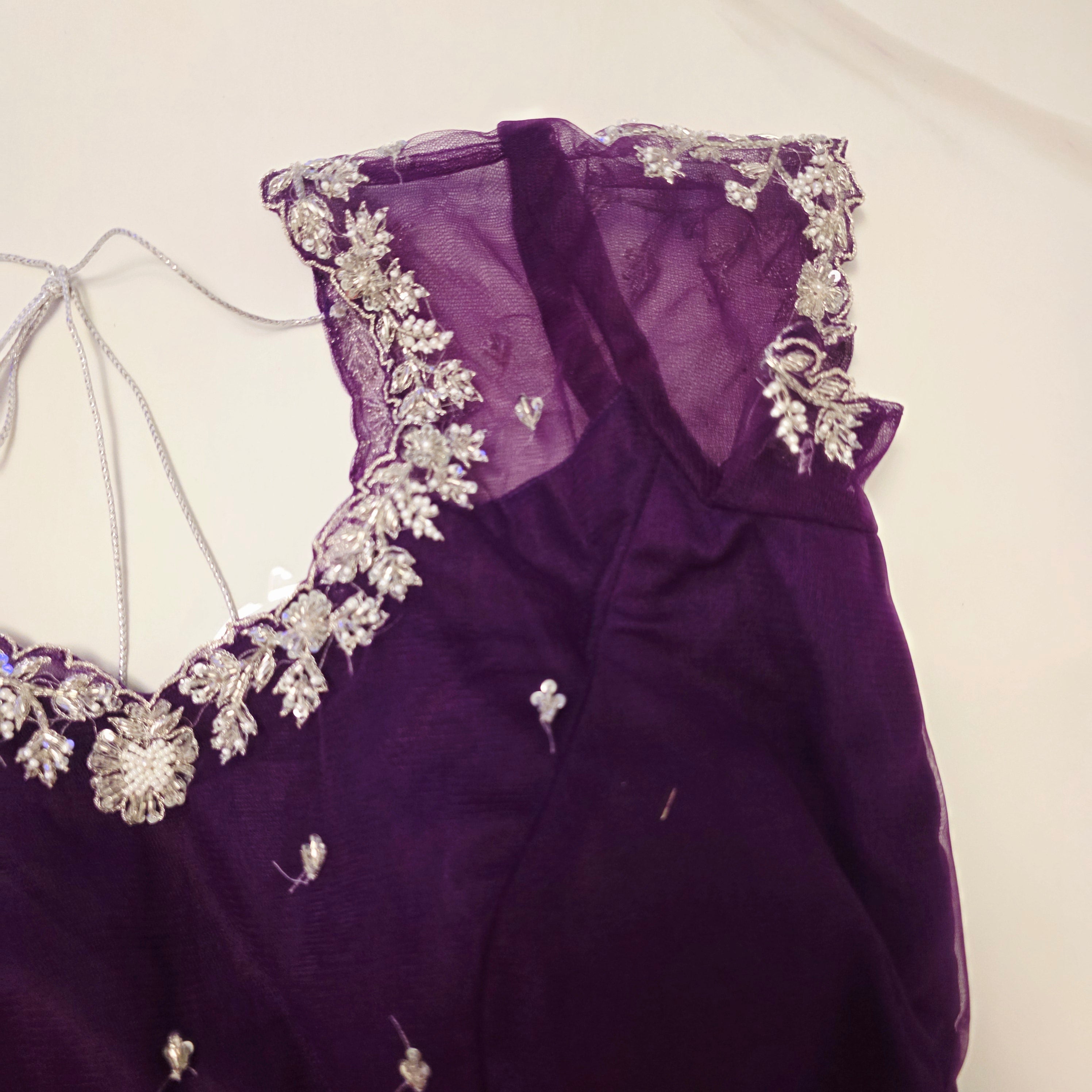 Violet Viscious Organza Stripes Saree With Leaf pattern mottifs paired with Net designer blouse