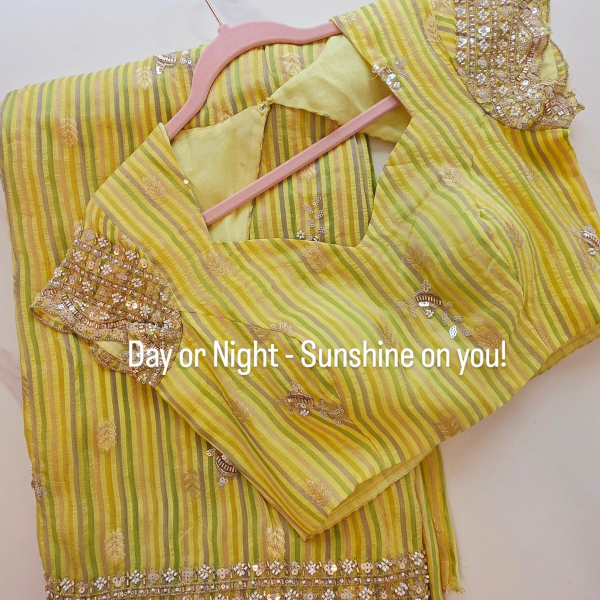 Womens yellow cocktail saree with sabhyasachi border