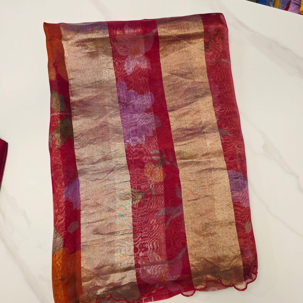 Latest Trendy Pure Organza Stripes Saree in Red Colour paired with Cute Blouse