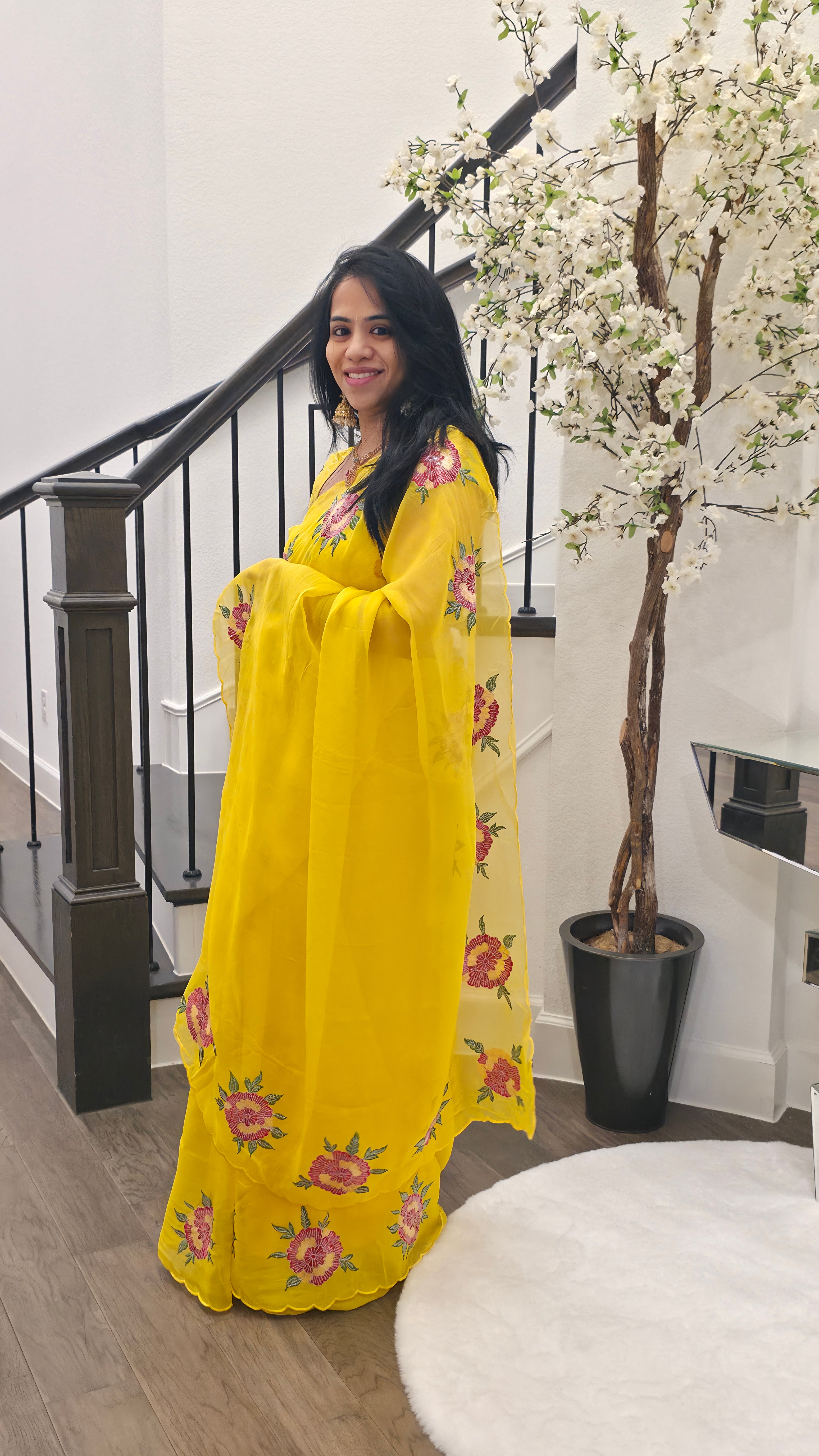 Yellow Saree With Floral Work Border paired with patterend blouse