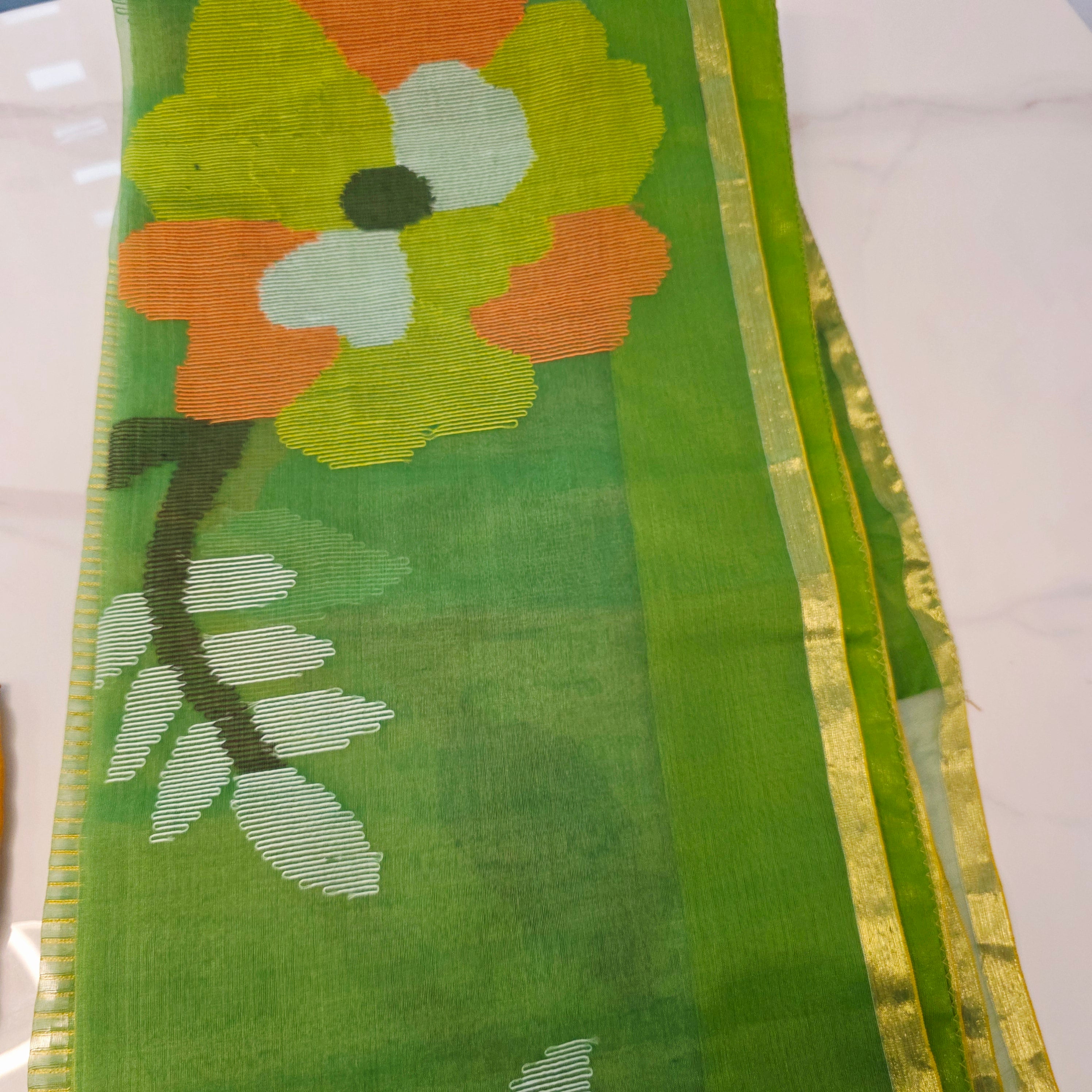 Green Muslin Jamdani Saree with Rich Yellow Pattu blouse