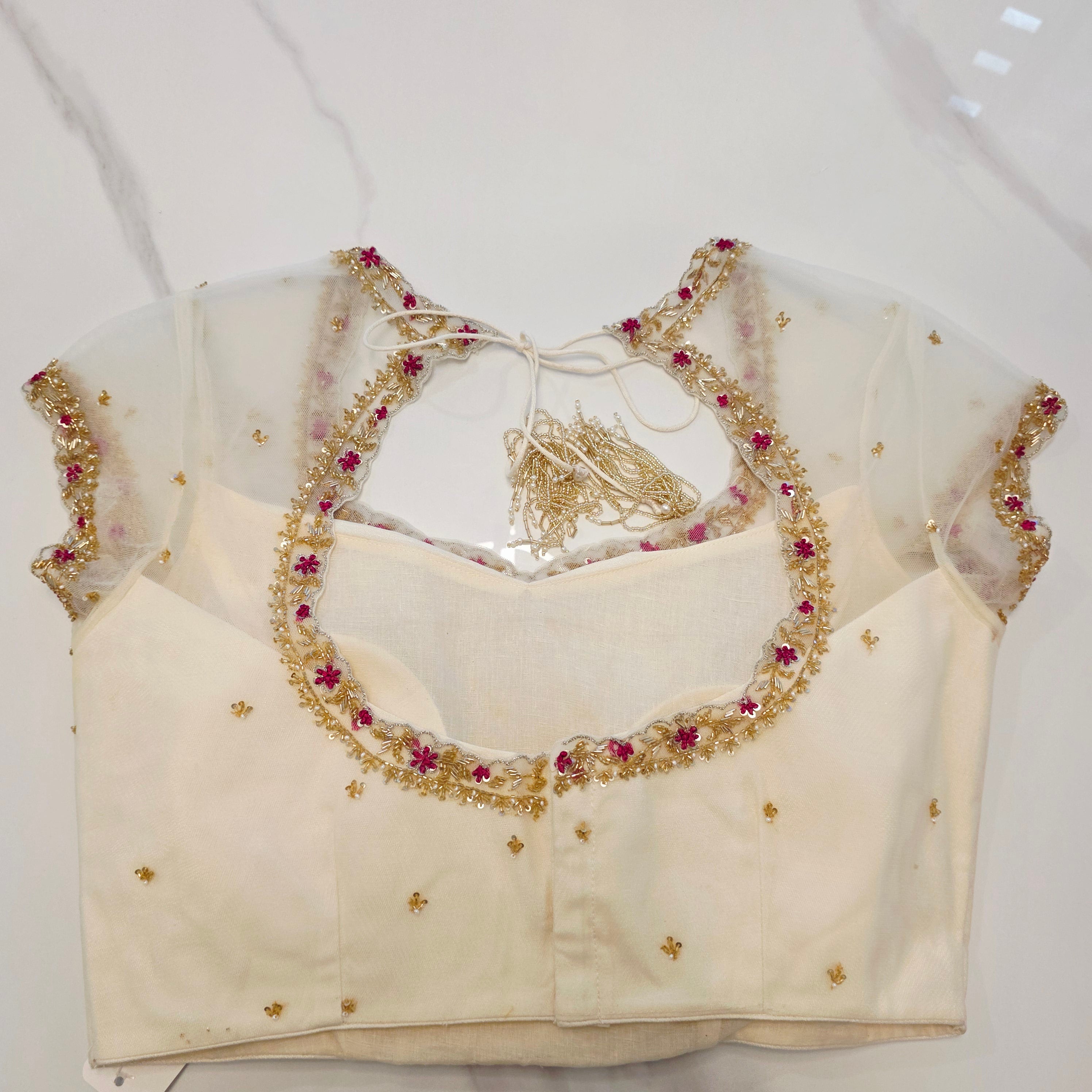 Pink Tissue Saree With Kalamkari Applique Work and Beautiful Net Blouse