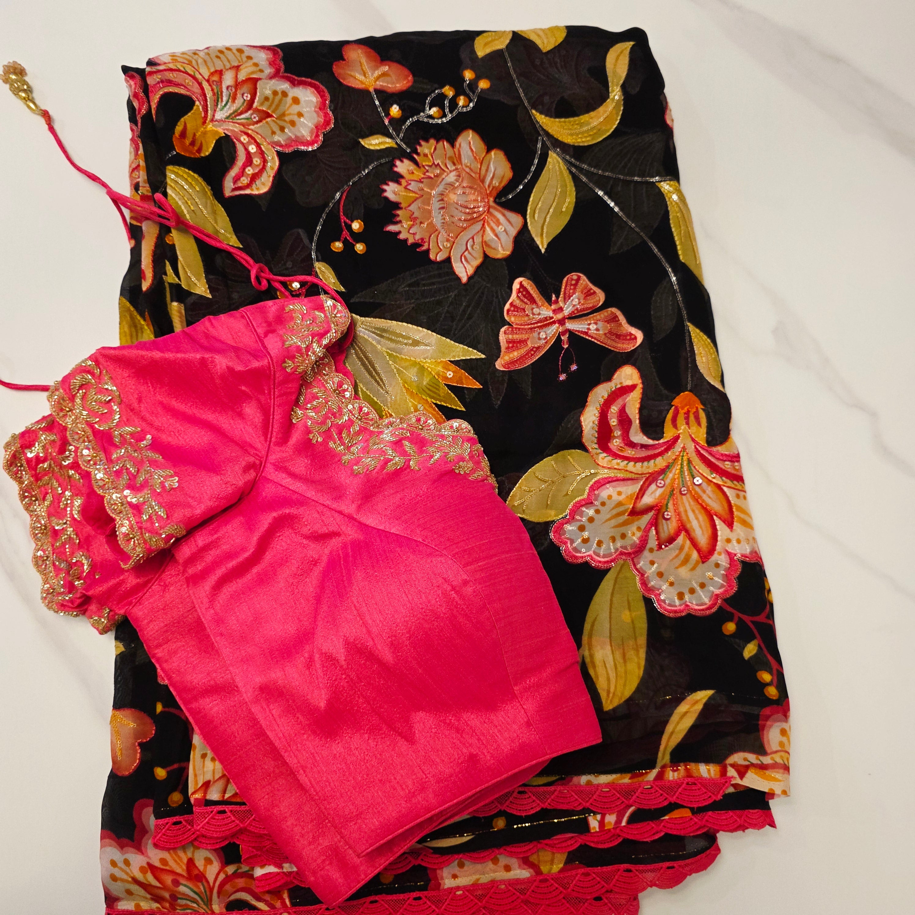 Trendy Black Floral Organza Saree With Maggam Work Blouse