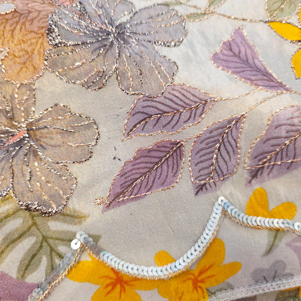 Light Pista Green Colour Cocktail Saree with all over floral sequins and yellow designer blouse