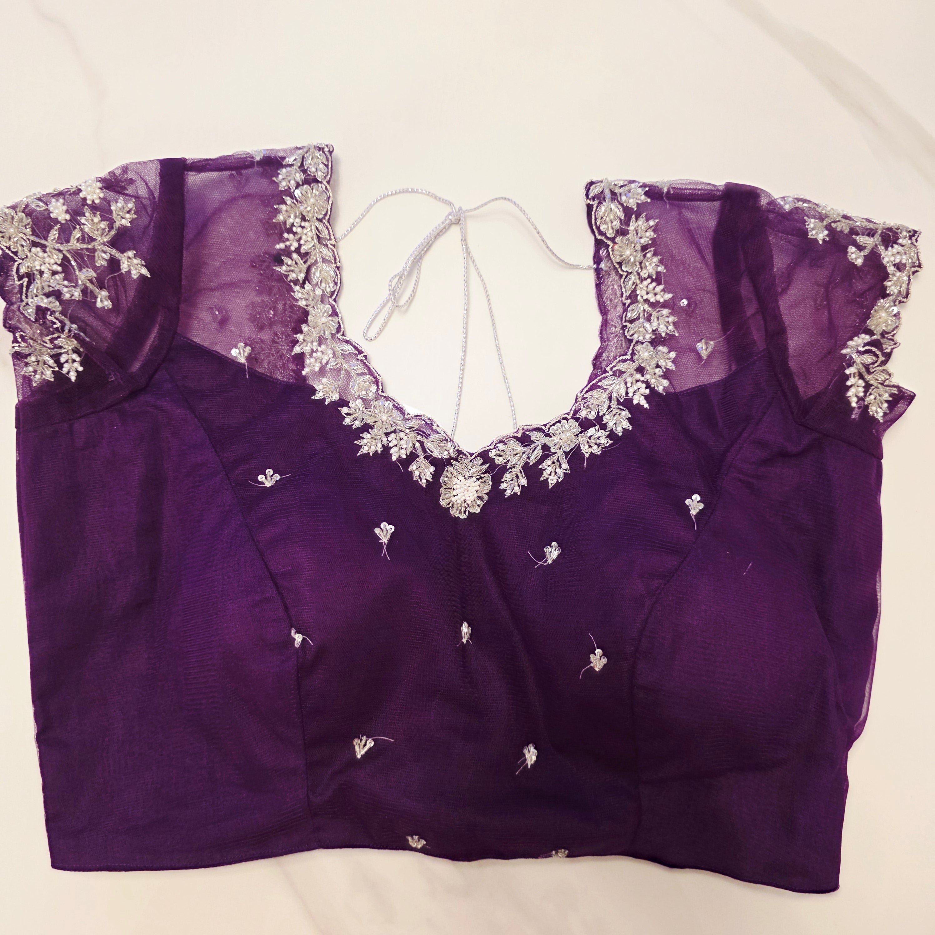 Violet Viscious Organza Stripes Saree With Leaf pattern mottifs paired with Net designer blouse