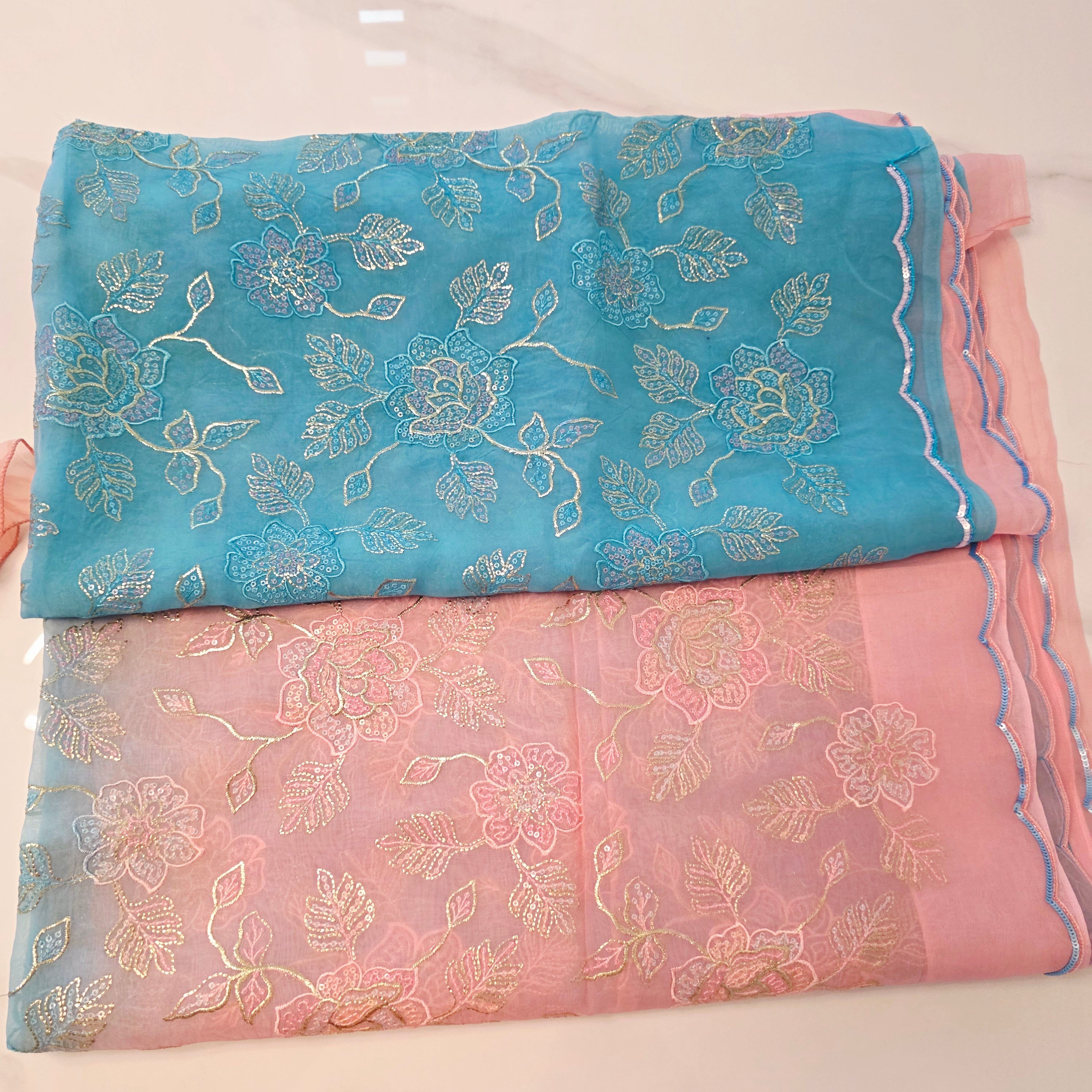 Pink and Blue Designer Saree with trending sleeves blouse.