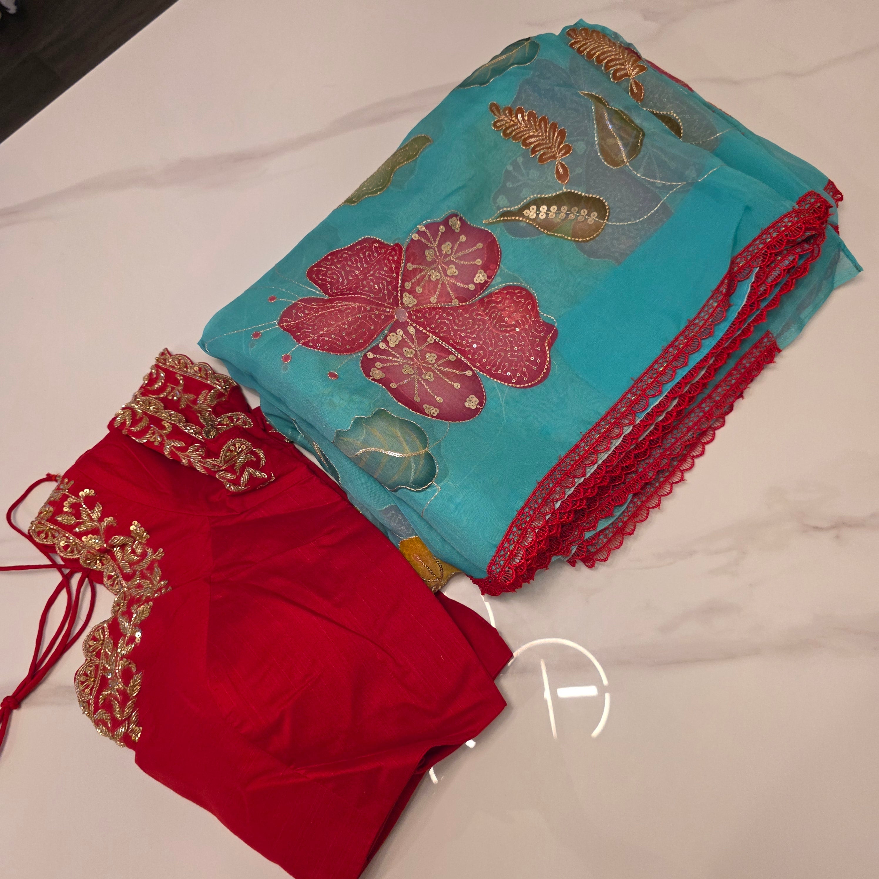 Teal Blue Oraganza Saree -Latest and Trendy with Floral Hibiscus theme paired with cute short sleeve blouse