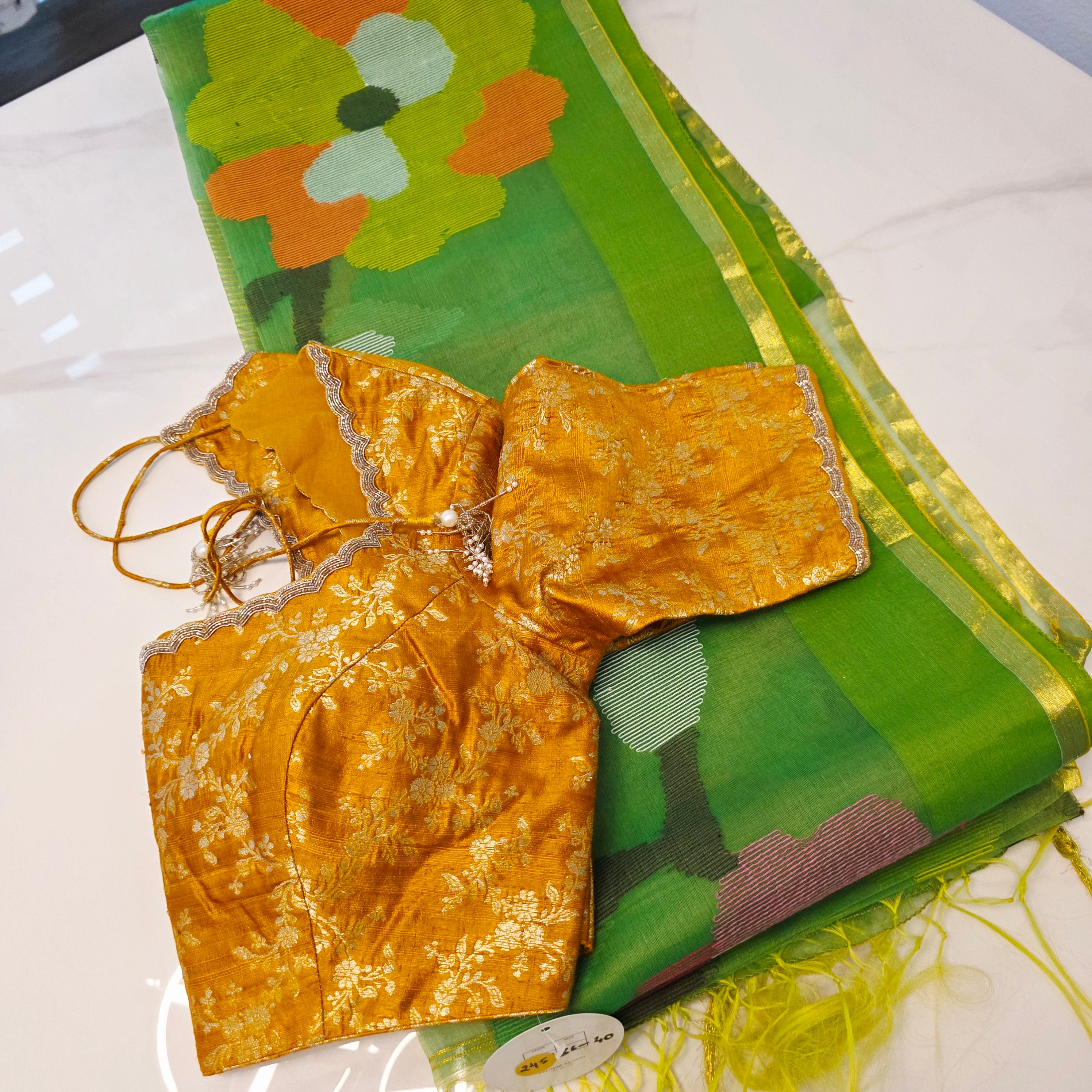 Green Muslin Jamdani Saree with Rich Yellow Pattu blouse