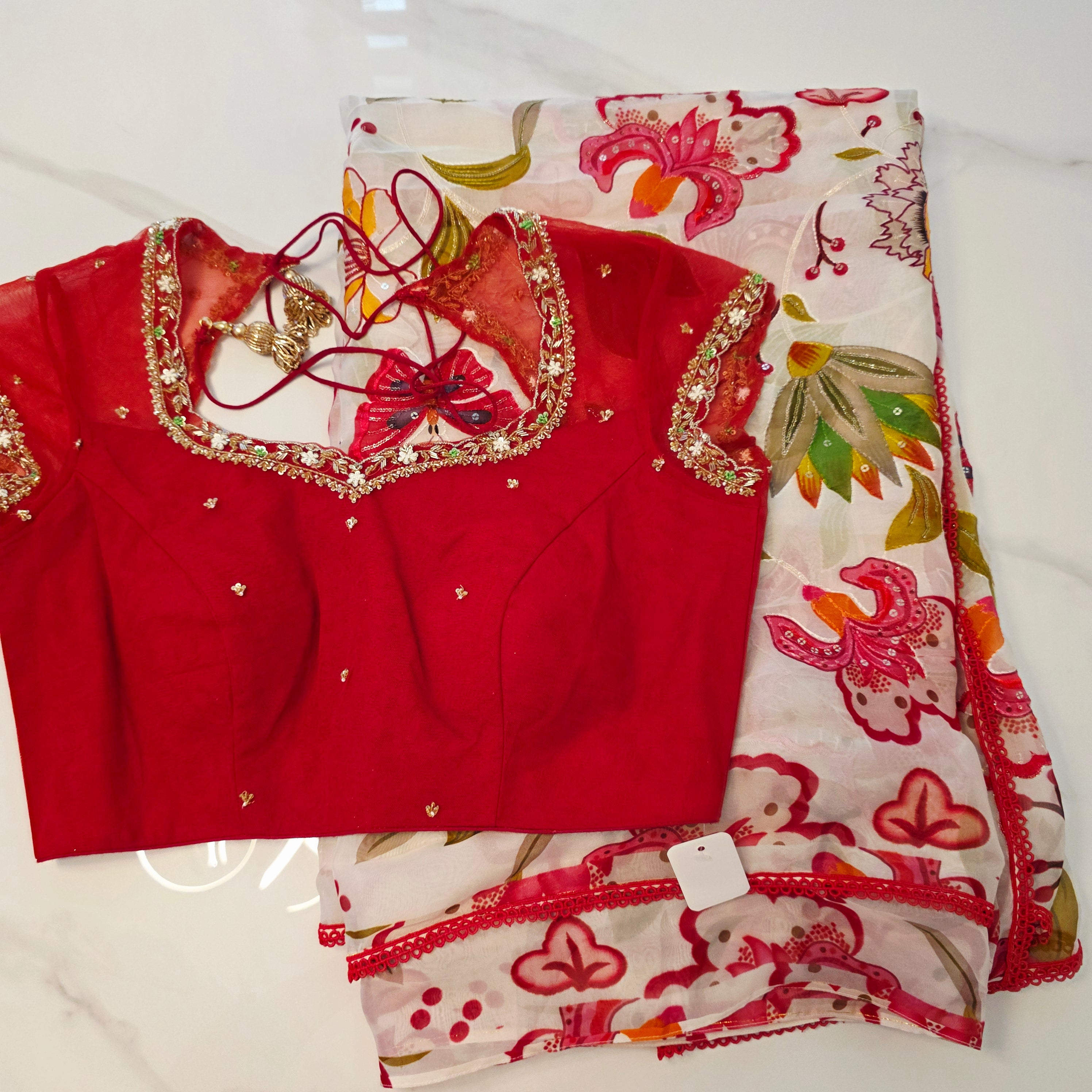 White Viscious Organza Saree with Floral pattern with Net designer Blouse