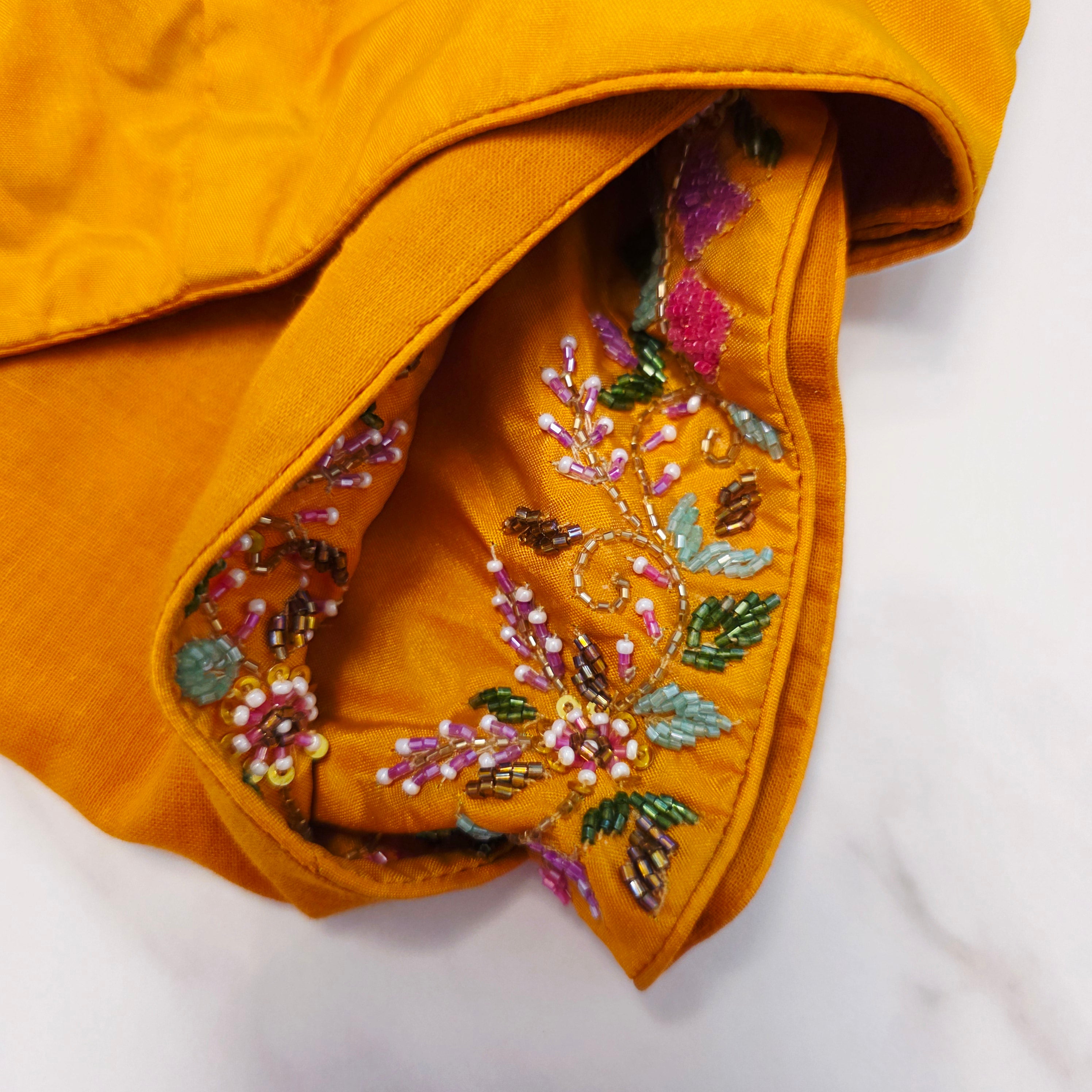 Light Pista Green Colour Cocktail Saree with all over floral sequins and yellow designer blouse