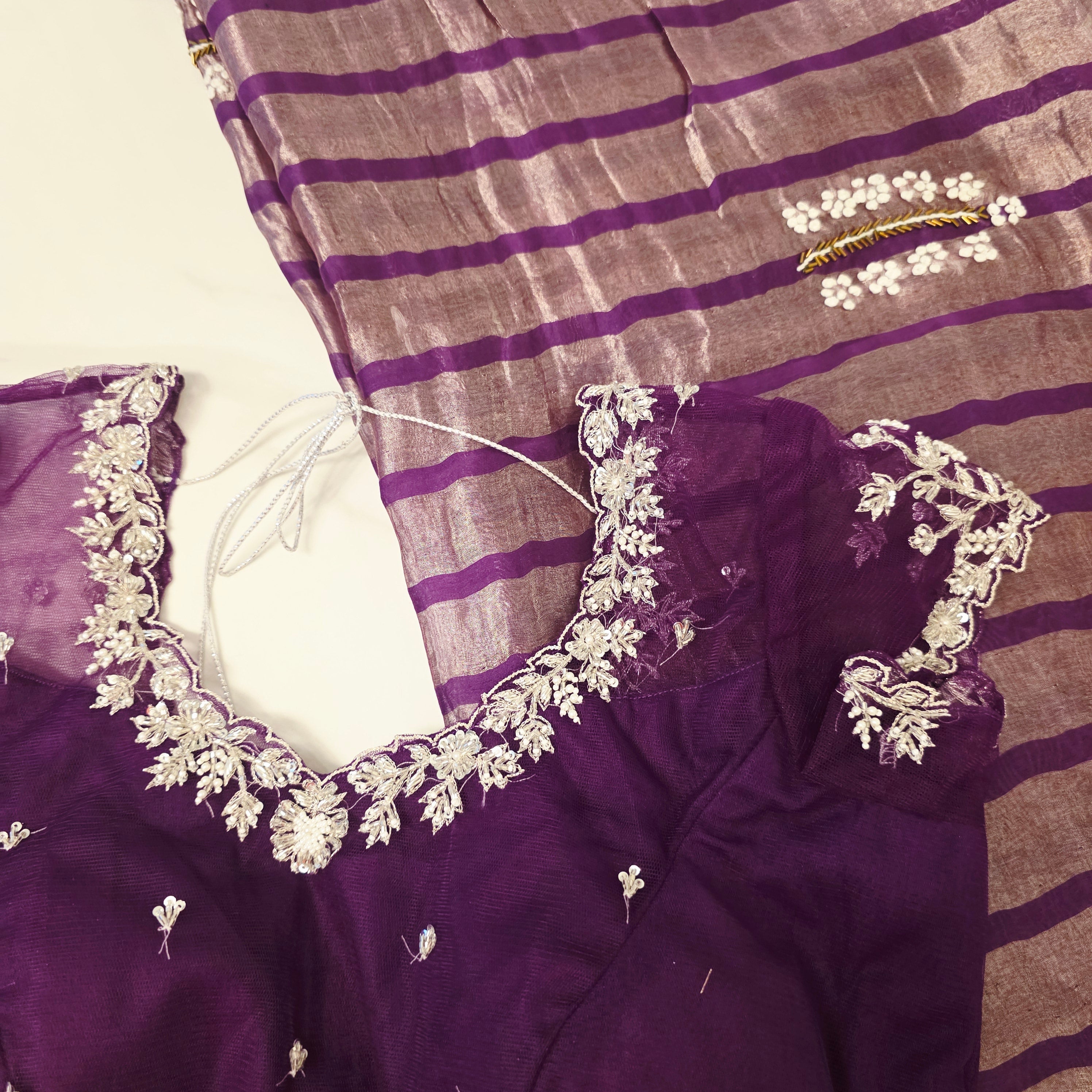 Violet Viscious Organza Stripes Saree With Leaf pattern mottifs paired with Net designer blouse