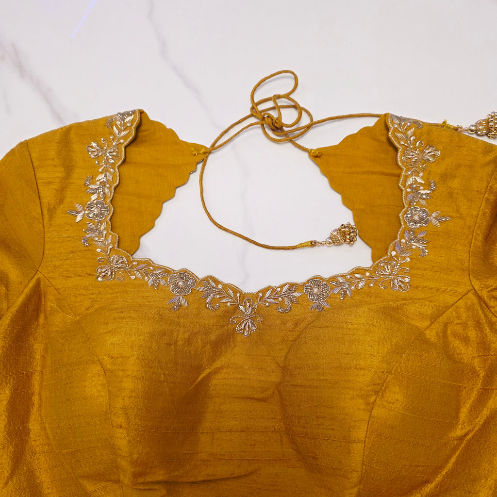Golden Yellow Pure Tissue Saree with Saree Highlights and Rawsilk Maggam work Blouse