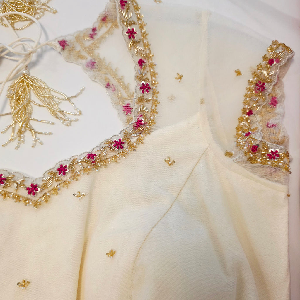 Pink Tissue Saree With Kalamkari Applique Work and Beautiful Net Blouse