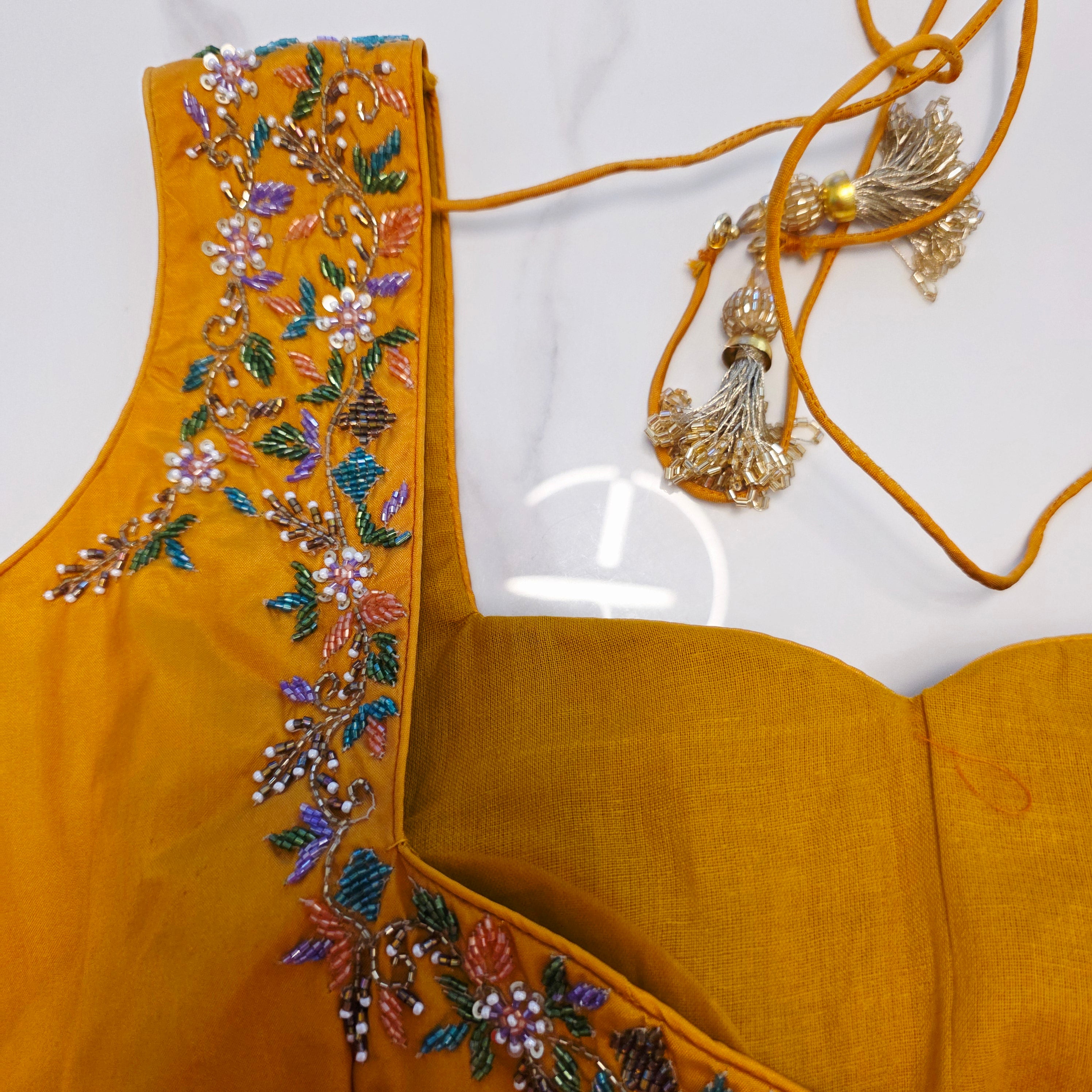 Light Pista Green Colour Cocktail Saree with all over floral sequins and yellow designer blouse