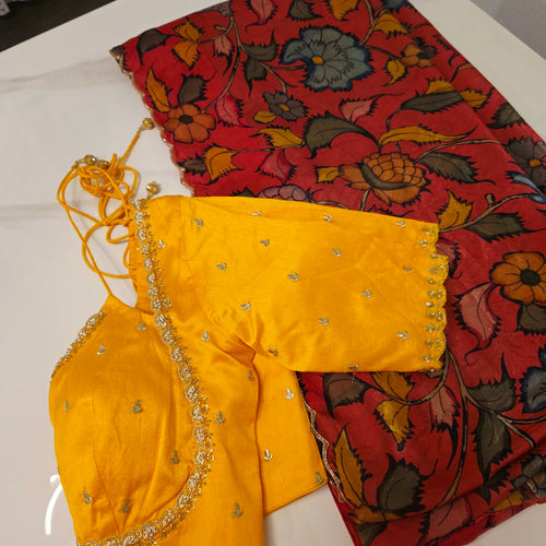 Orangefarbener Crape-Seide-Sari mit gelber Jackenbluse