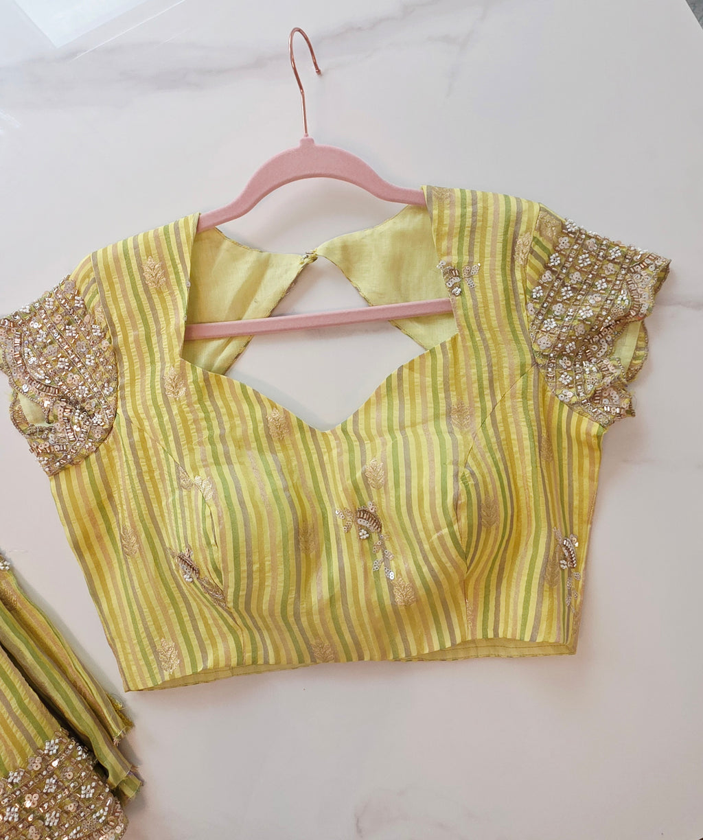 Womens yellow cocktail saree with sabhyasachi border