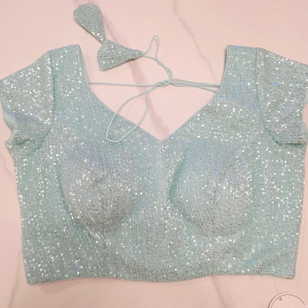 Skyblue Sequin Partywear Saree With allover Roses paired with soft sequin blouse