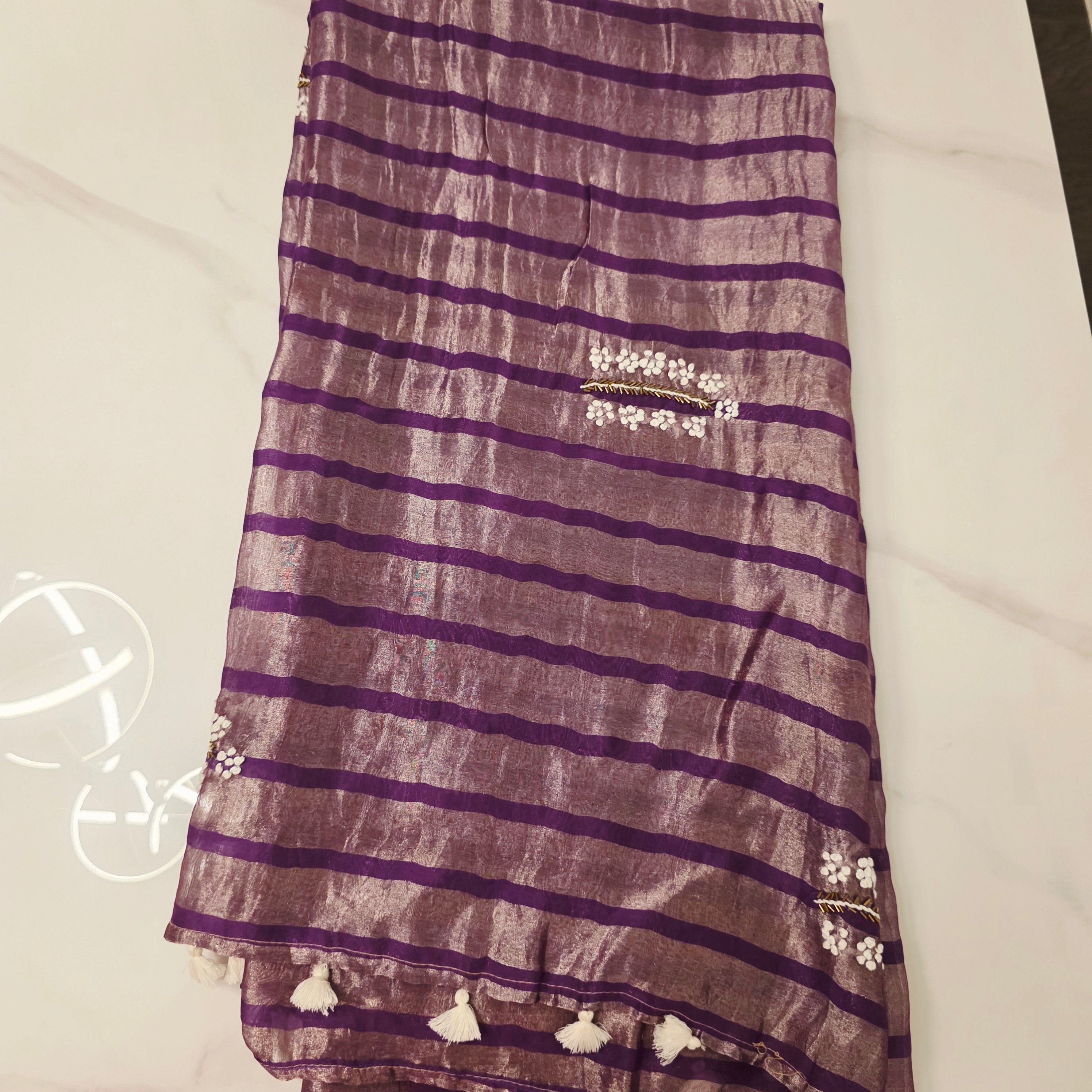 Violet Viscious Organza Stripes Saree With Leaf pattern mottifs paired with Net designer blouse