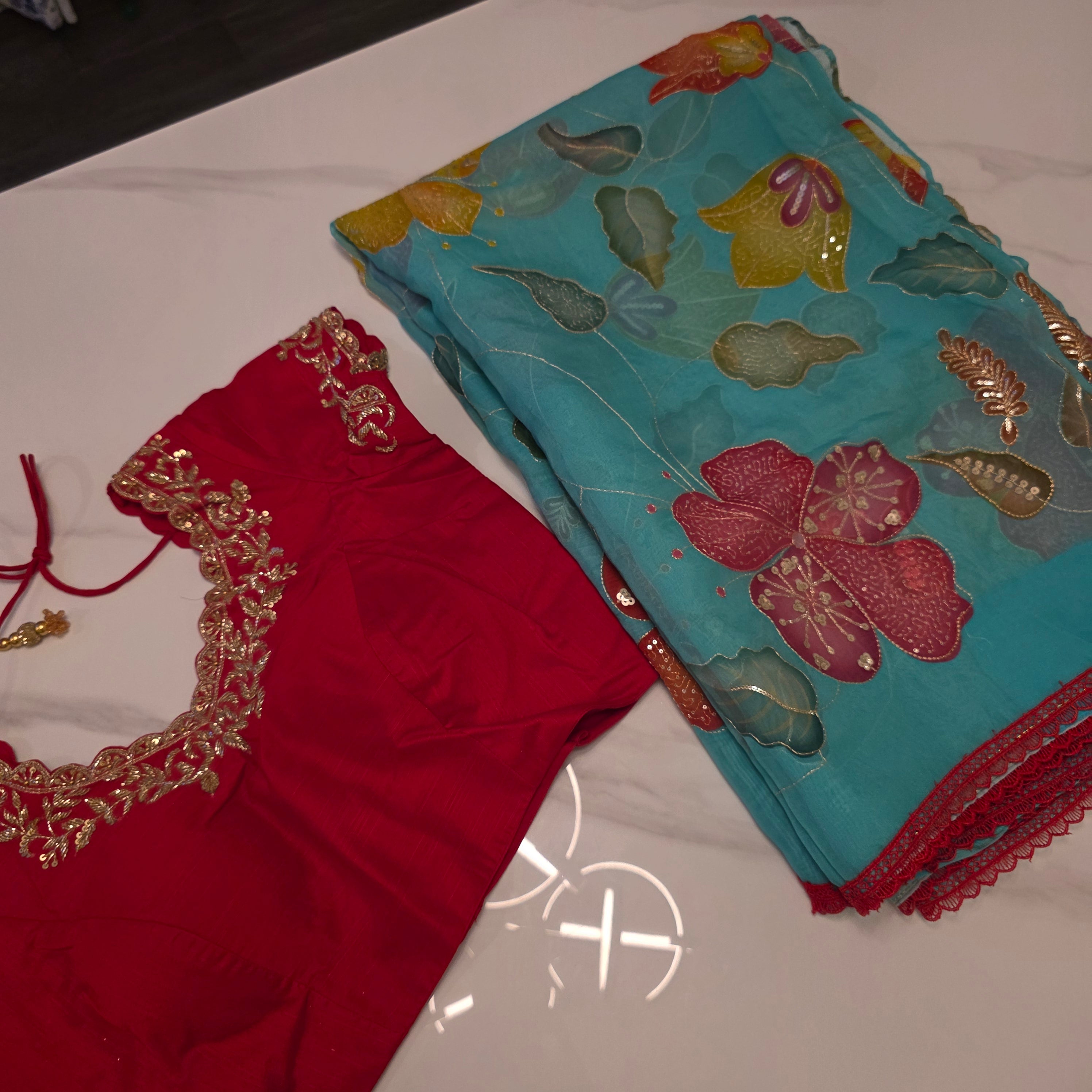 Teal Blue Oraganza Saree -Latest and Trendy with Floral Hibiscus theme paired with cute short sleeve blouse