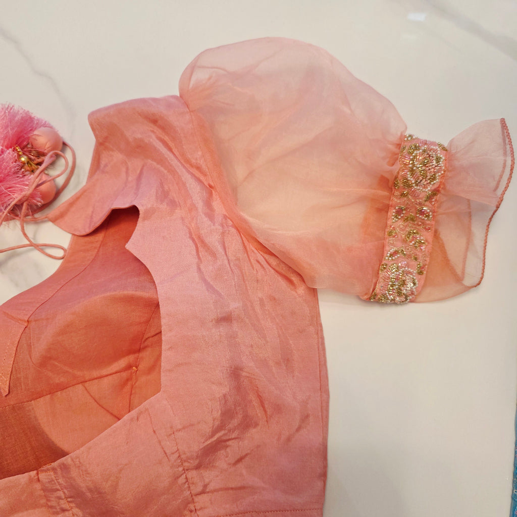 Pink and Blue Designer Saree with trending sleeves blouse.