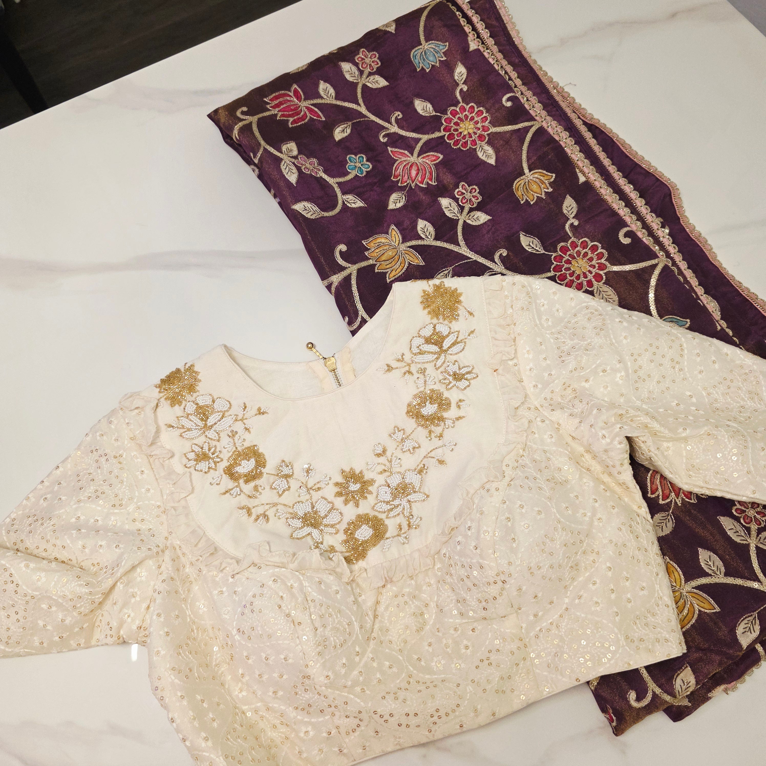 Violet Tissue Saree with Kalamkari Patch work paired with designer blouse