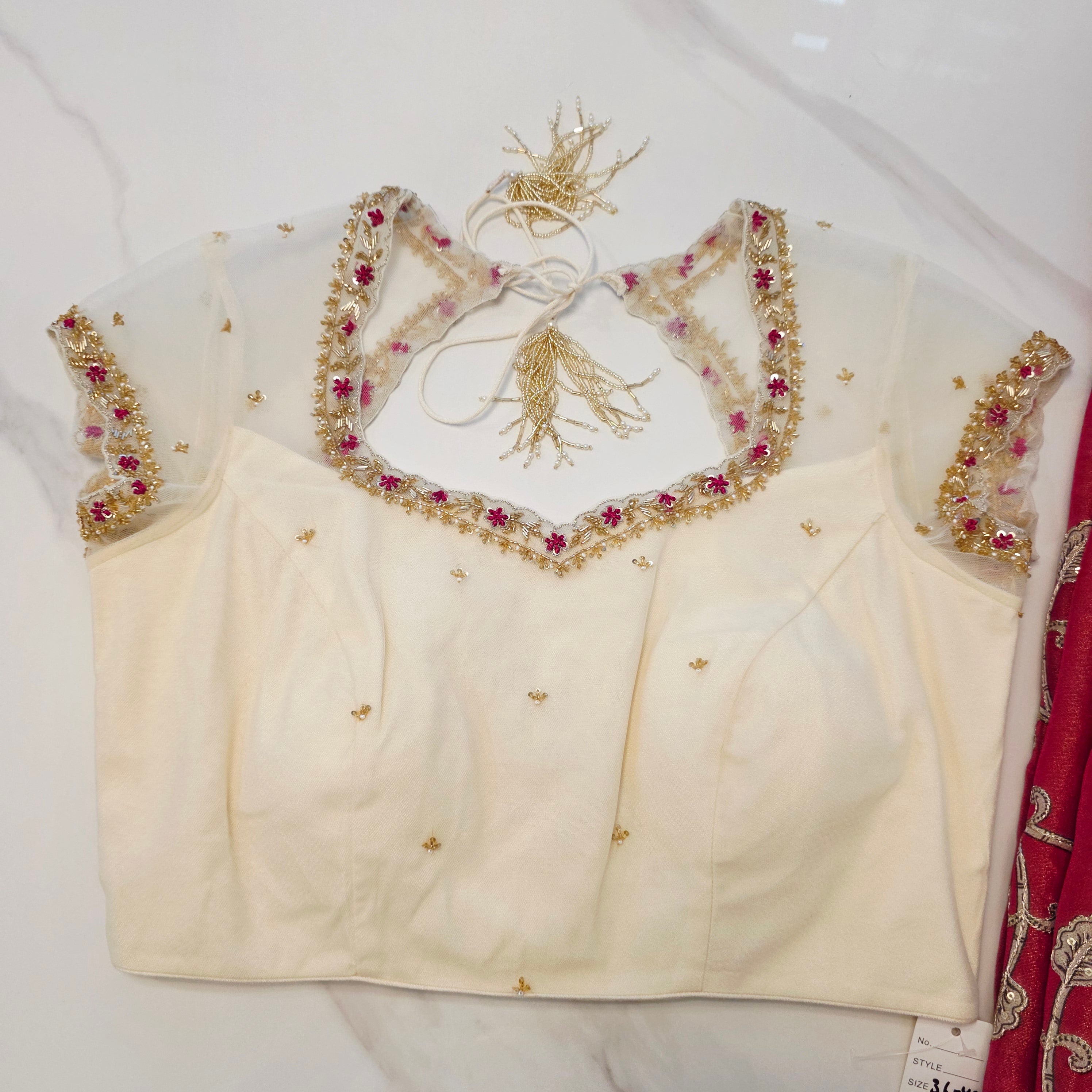 Pink Tissue Saree With Kalamkari Applique Work and Beautiful Net Blouse