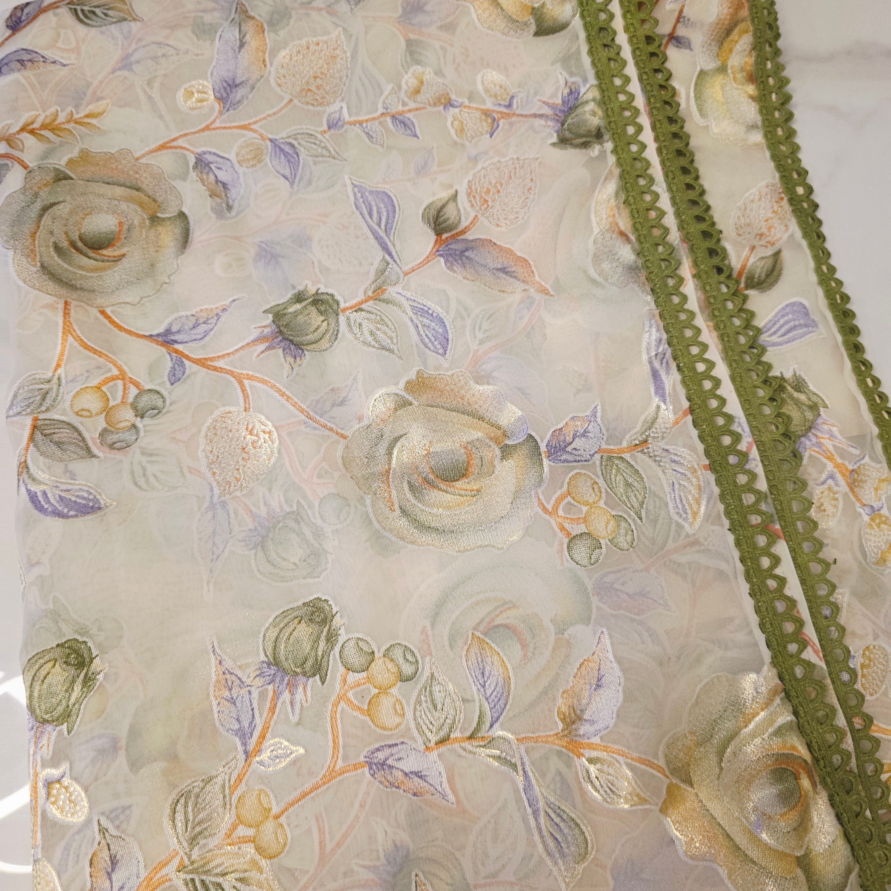 Milky White and Green Brasso Saree with Crush Maggam work blouse