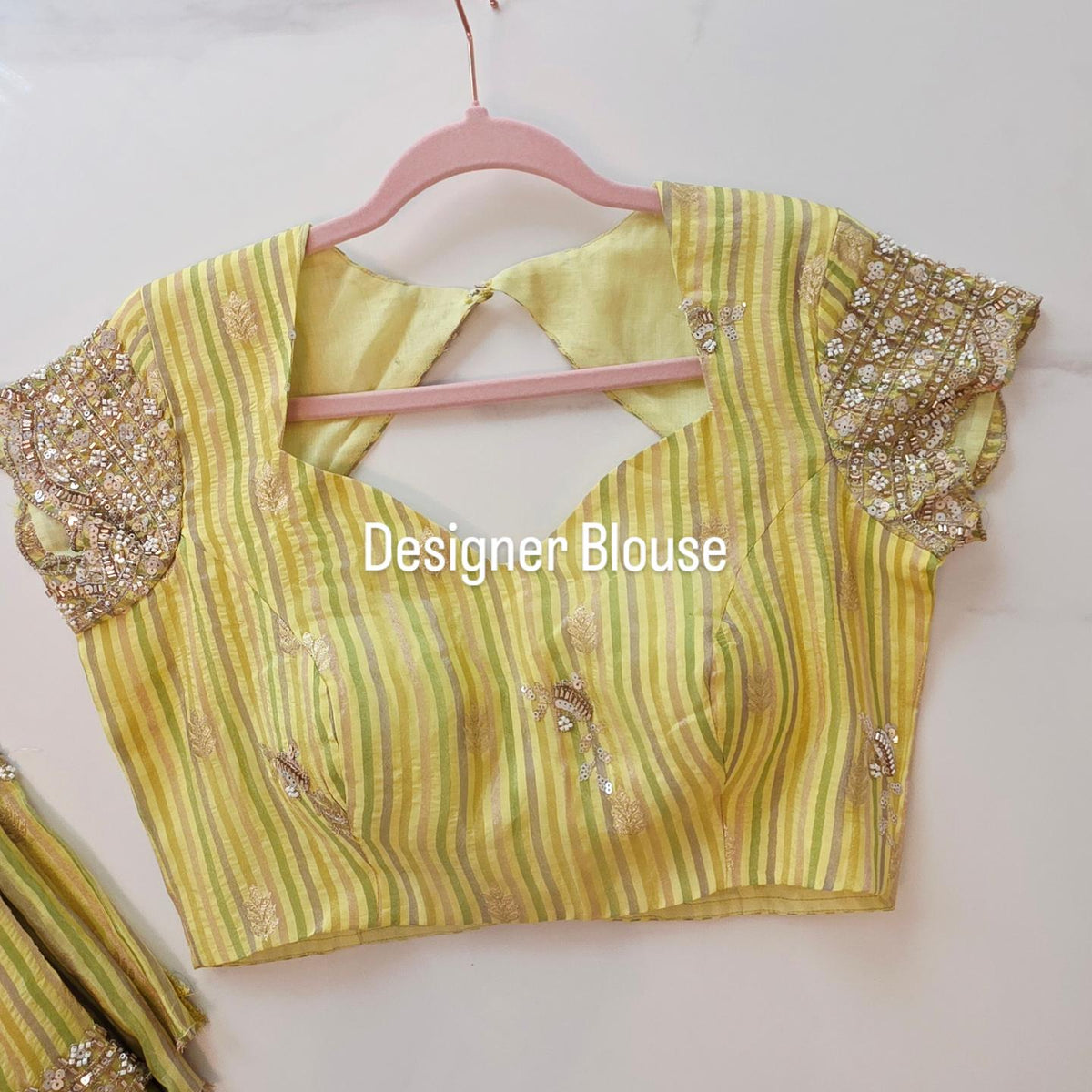 Womens yellow cocktail saree with sabhyasachi border