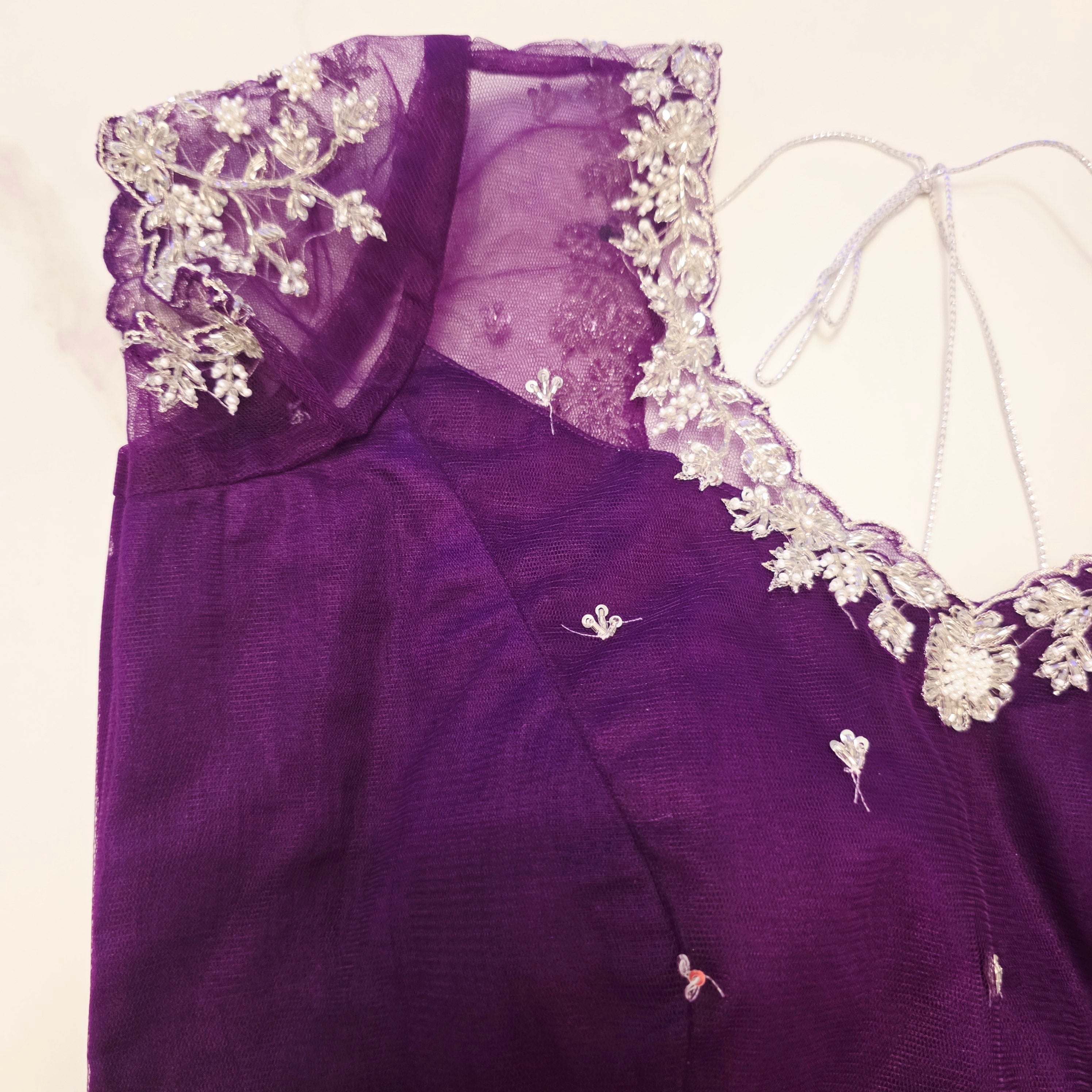 Violet Viscious Organza Stripes Saree With Leaf pattern mottifs paired with Net designer blouse