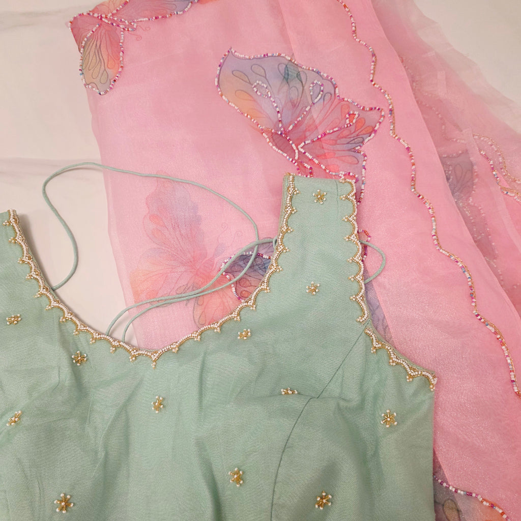 Babypink glass organza butterfly saree with Pistagreen netblouse