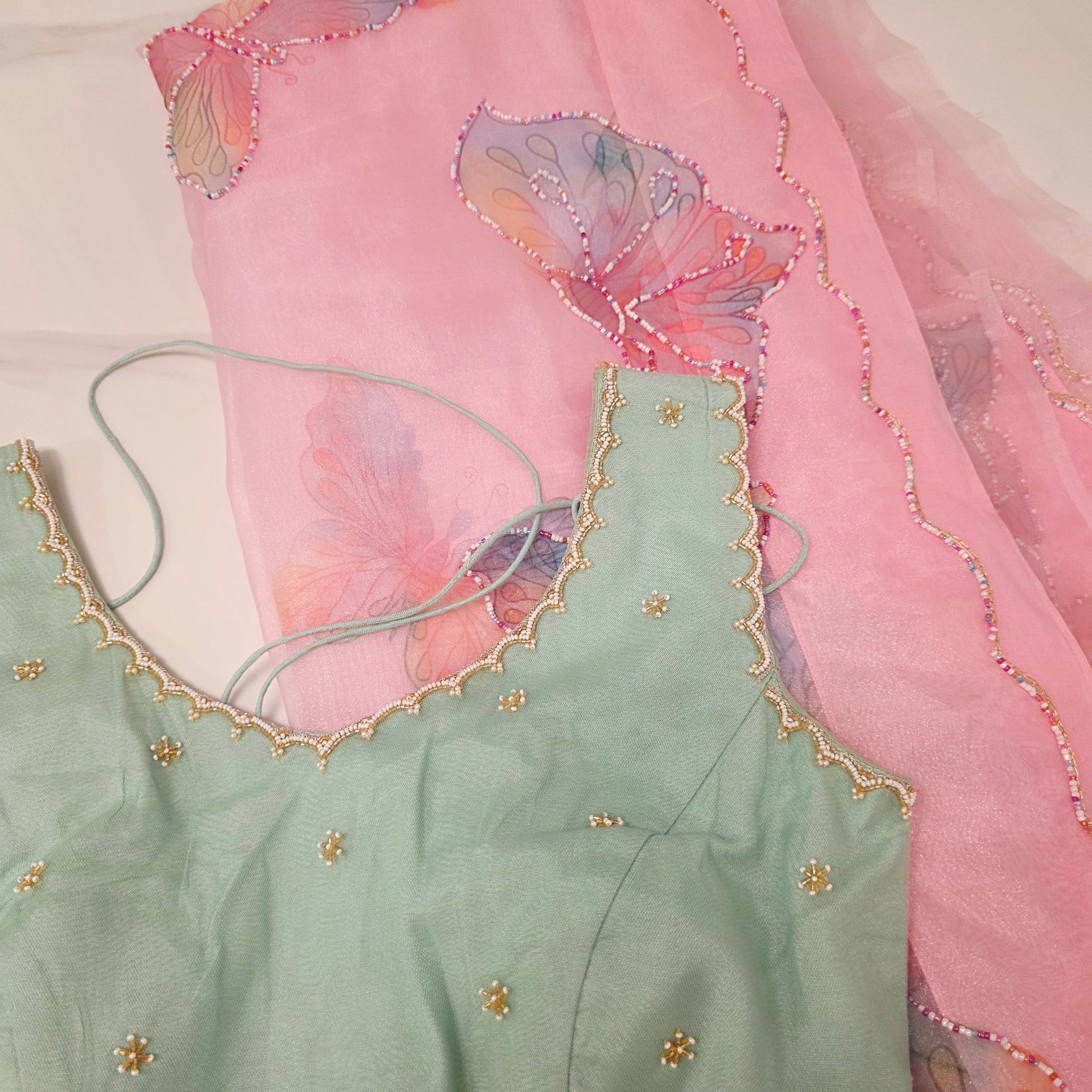 Babypink glass organza butterfly saree with Pistagreen netblouse
