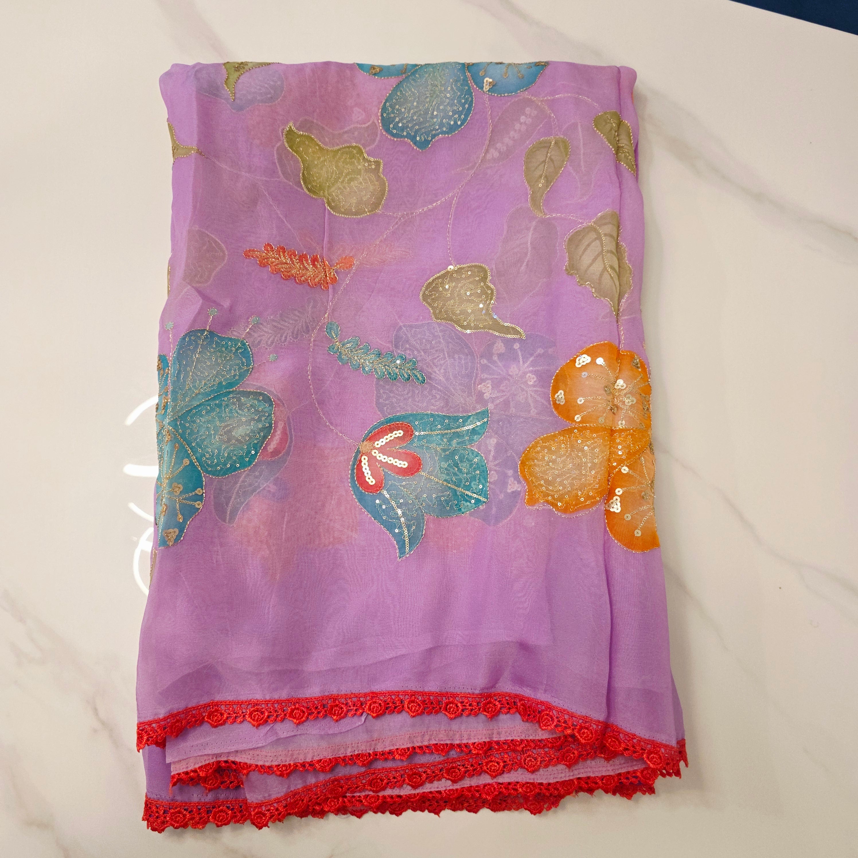 Purple Latest and Trendy Saree with Floral Hibiscus theme in paired with cute short sleeve blouse