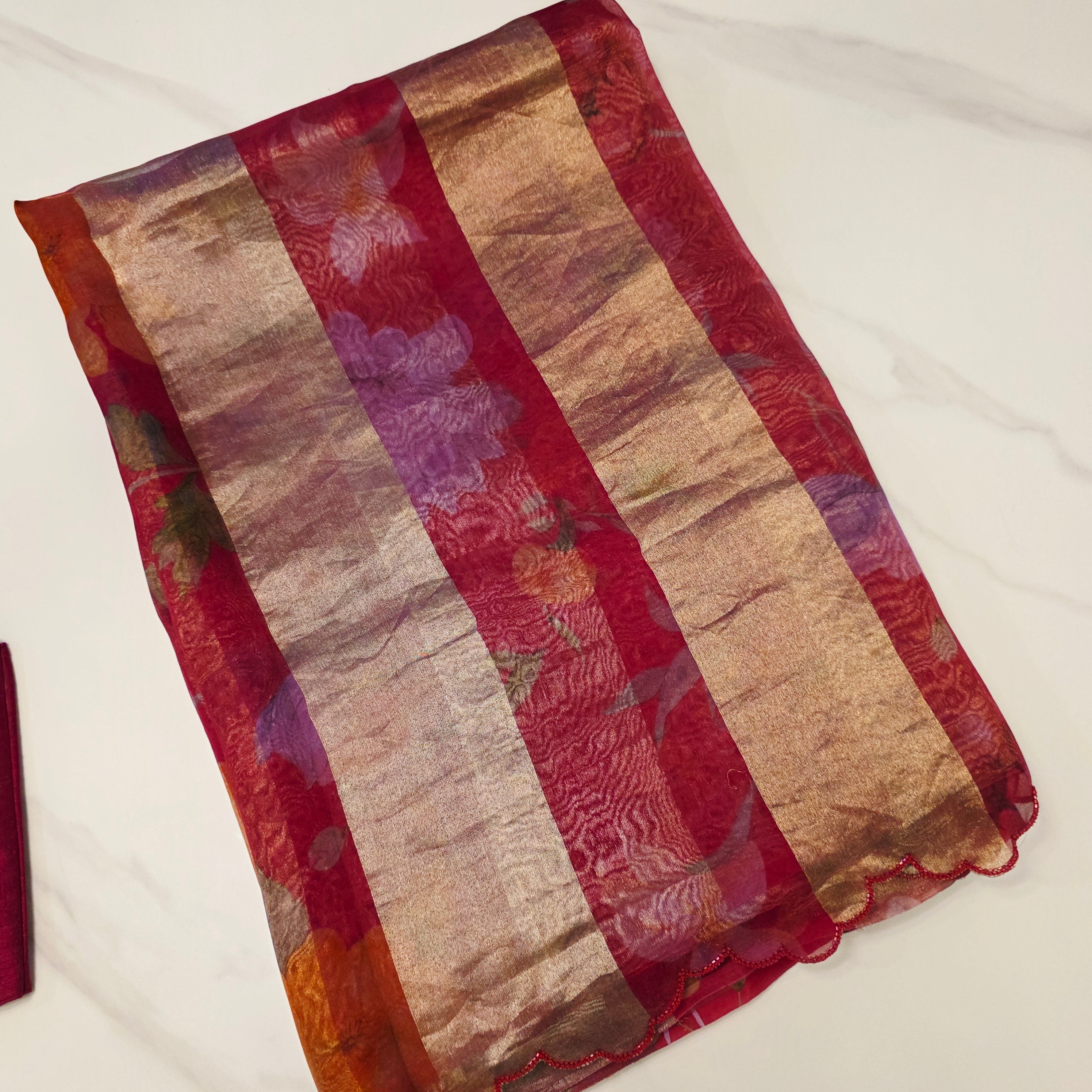Latest Trendy Pure Organza Stripes Saree in Red Colour paired with Cute Blouse