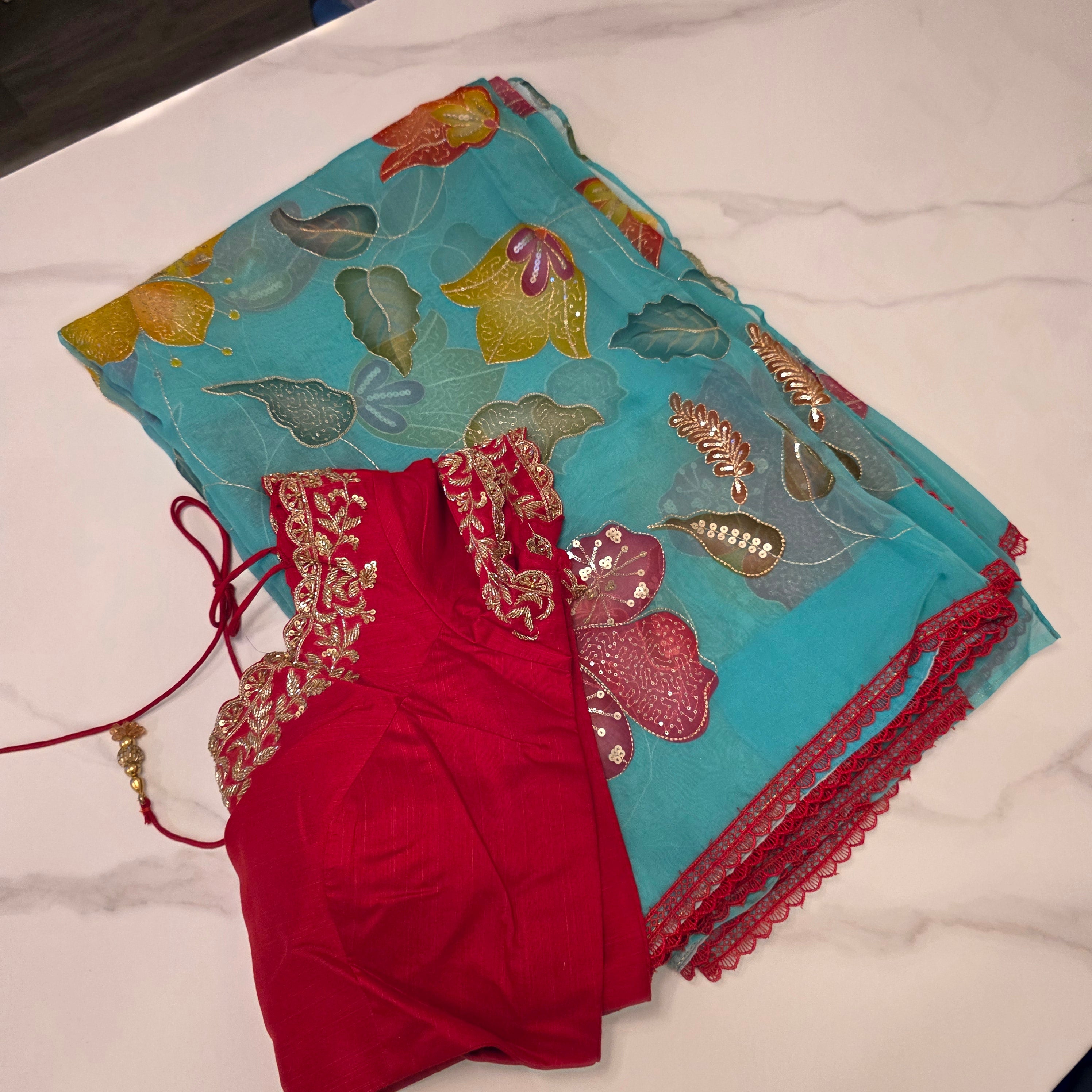 Teal Blue Oraganza Saree -Latest and Trendy with Floral Hibiscus theme paired with cute short sleeve blouse