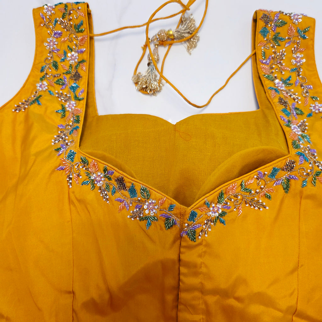 Light Pista Green Colour Cocktail Saree with all over floral sequins and yellow designer blouse