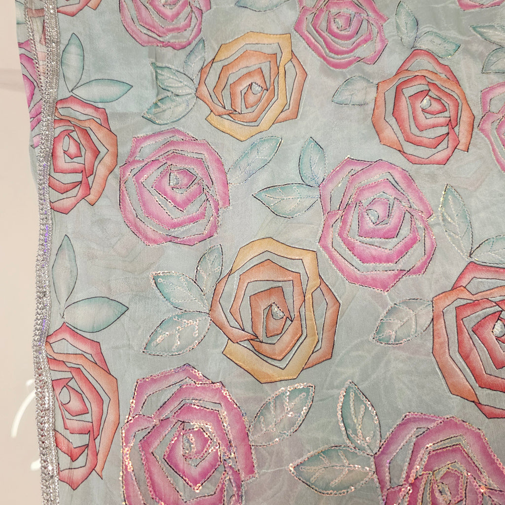 Skyblue Sequin Partywear Saree With allover Roses paired with soft sequin blouse