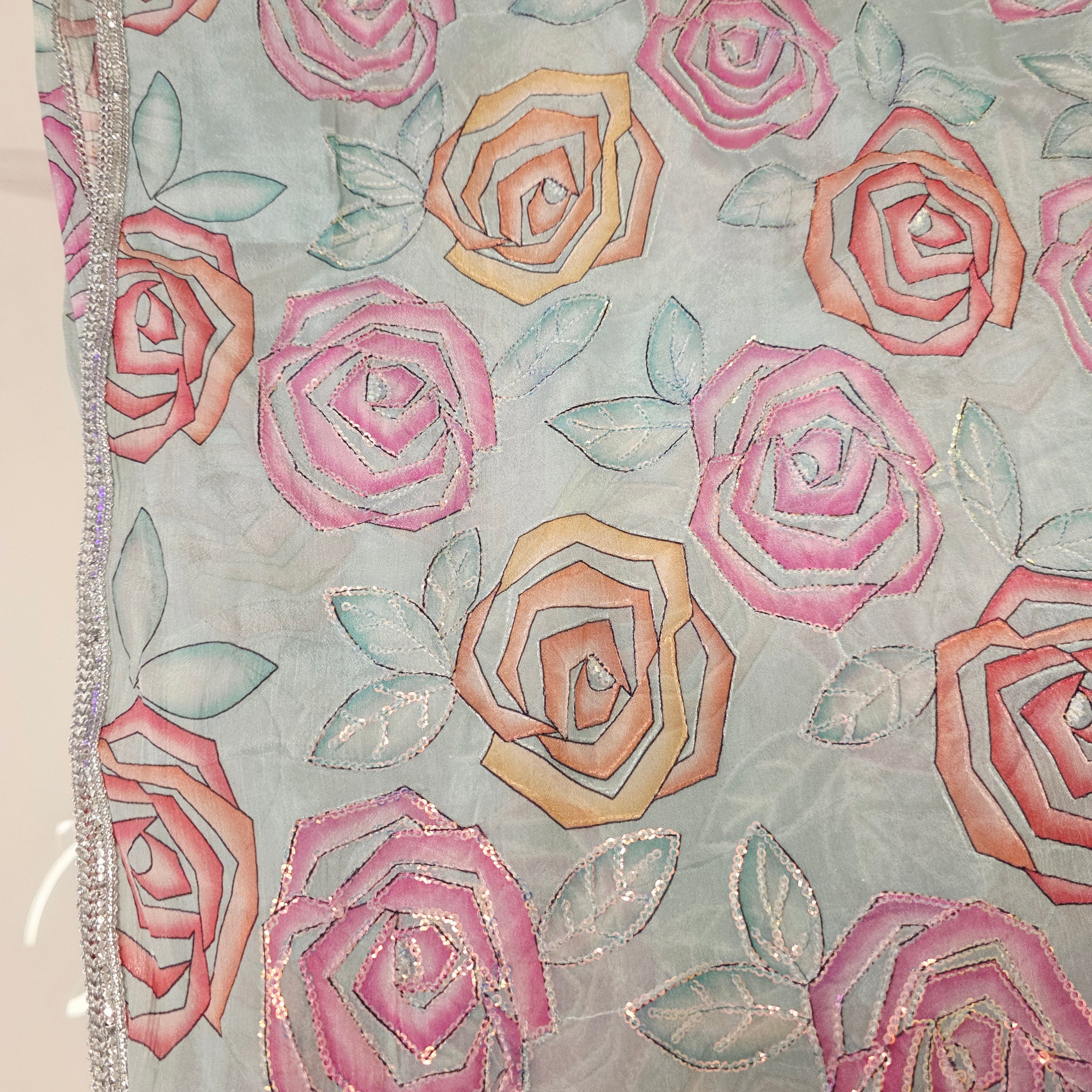 Skyblue Sequin Partywear Saree With allover Roses paired with soft sequin blouse