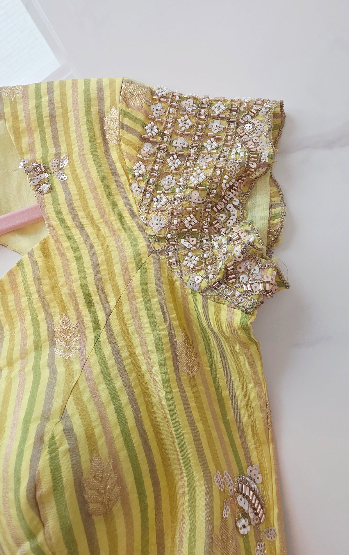 Womens yellow cocktail saree with sabhyasachi border