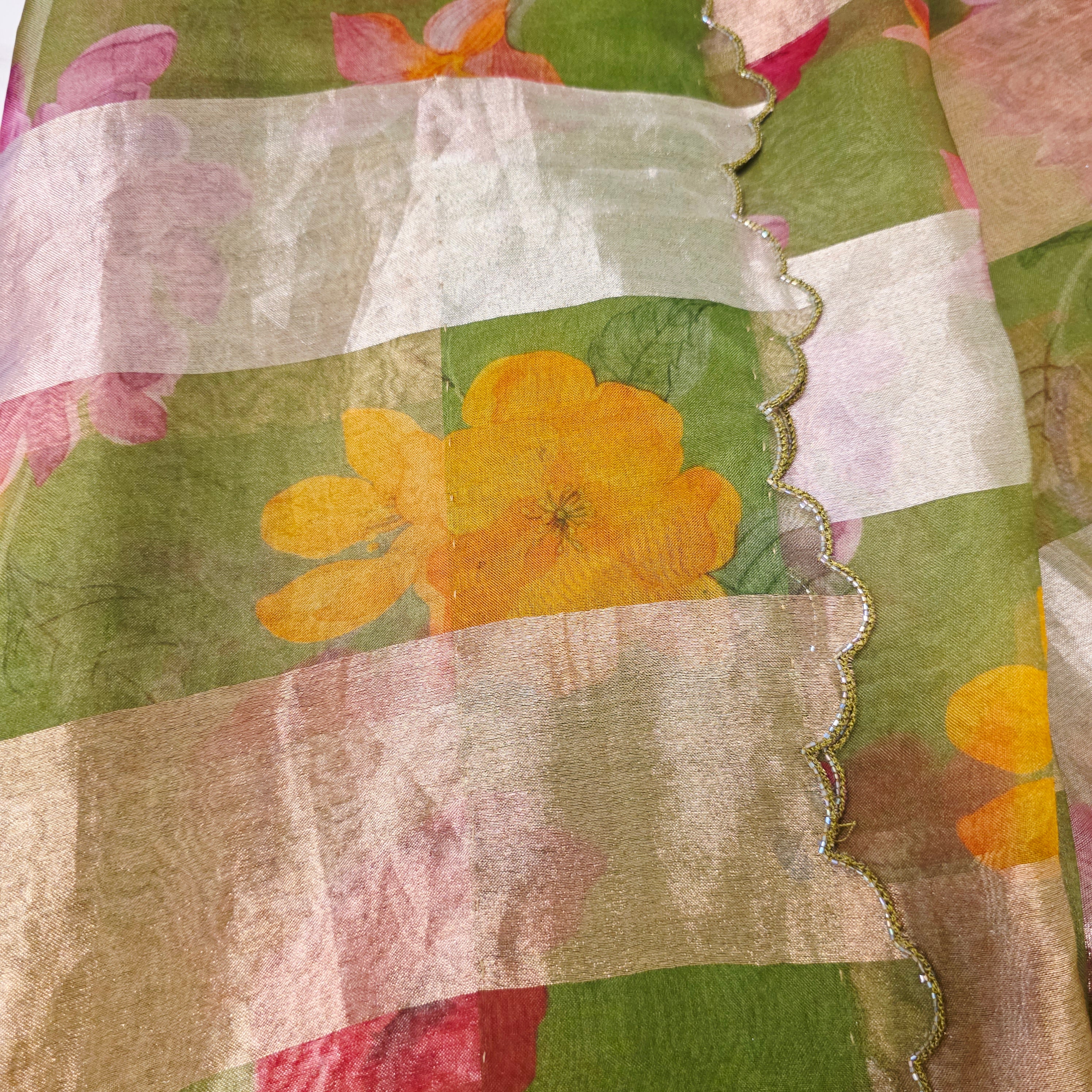 Green Stripes Premium Organza Saree with Cutwork borders paired with Tissue Rawsilk Maggam Blouse