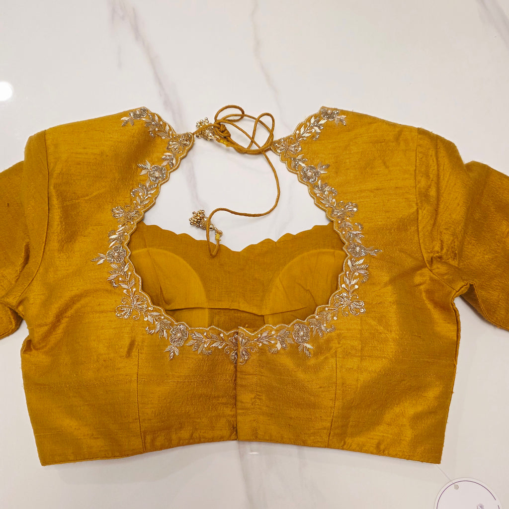 Golden Yellow Pure Tissue Saree with Saree Highlights and Rawsilk Maggam work Blouse