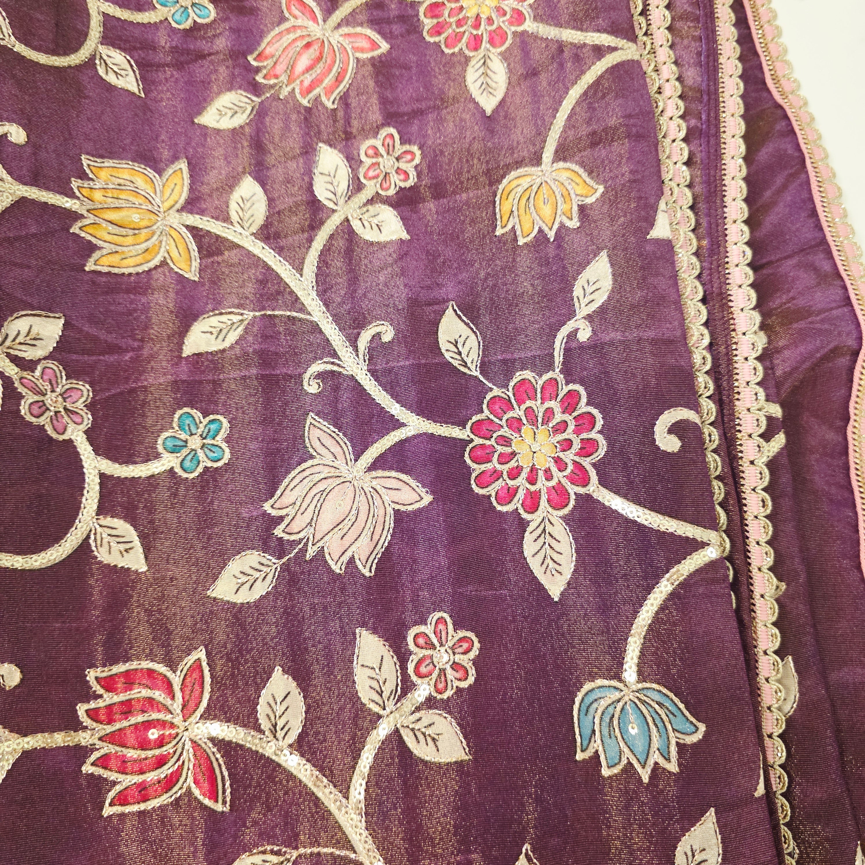 Violet Tissue Saree with Kalamkari Patch work paired with designer blouse