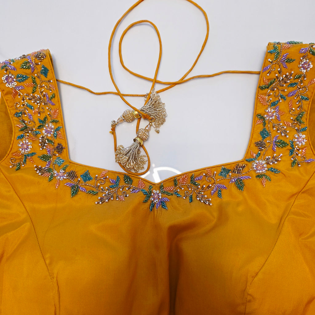 Light Pista Green Colour Cocktail Saree with all over floral sequins and yellow designer blouse