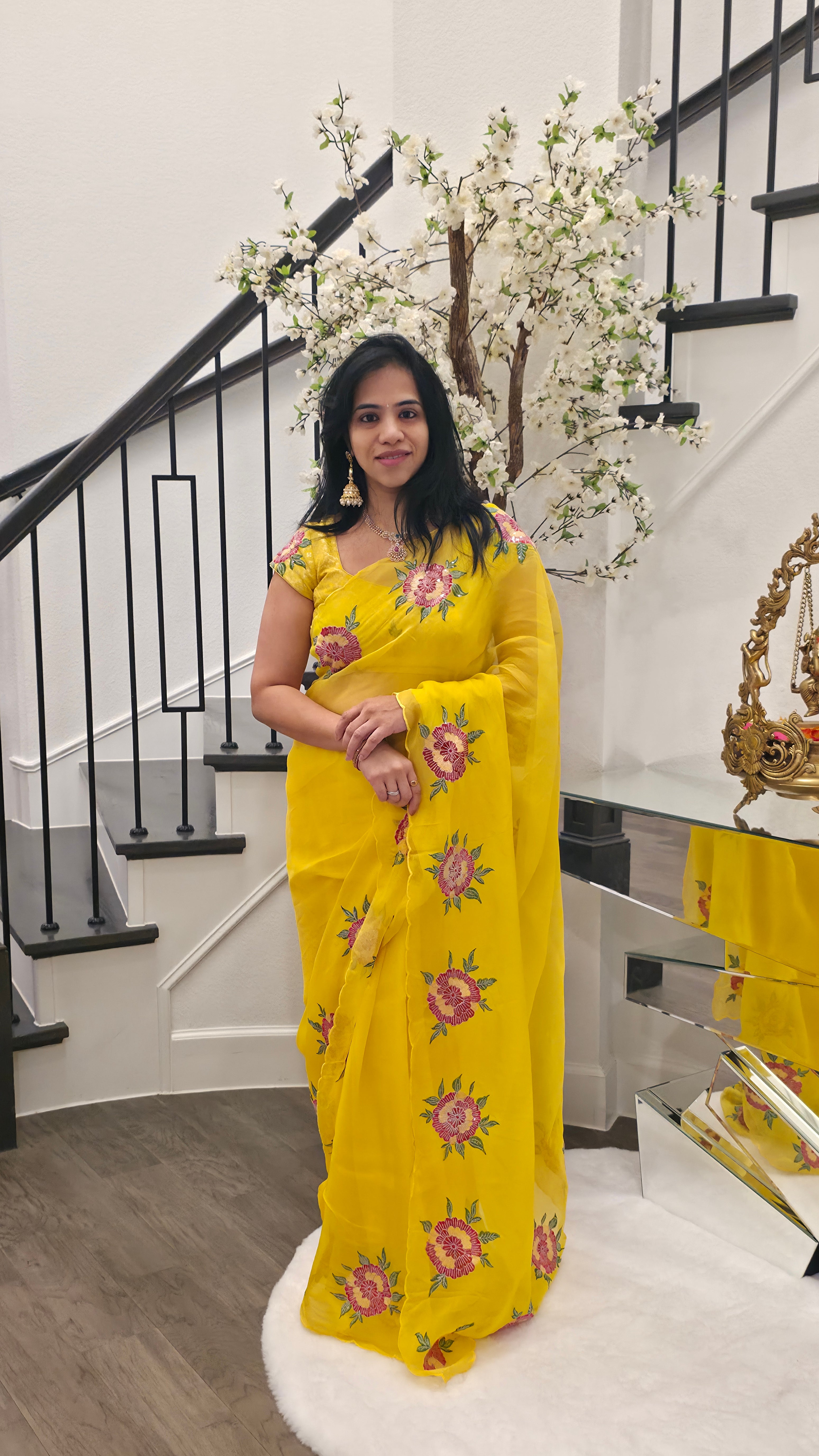 Yellow Saree With Floral Work Border paired with patterend blouse