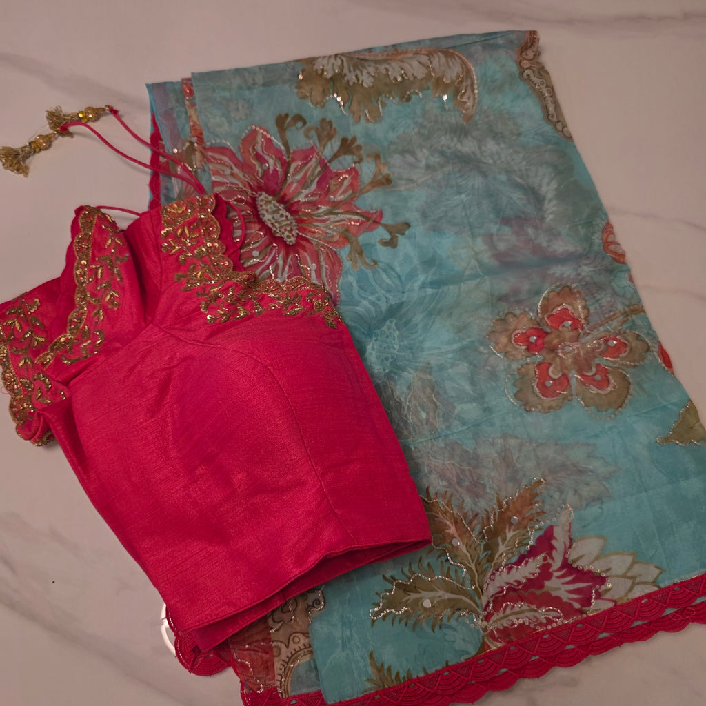 Light Blue Shiny Viscious Organza Saree paied with beautiful Maggam work Blouse