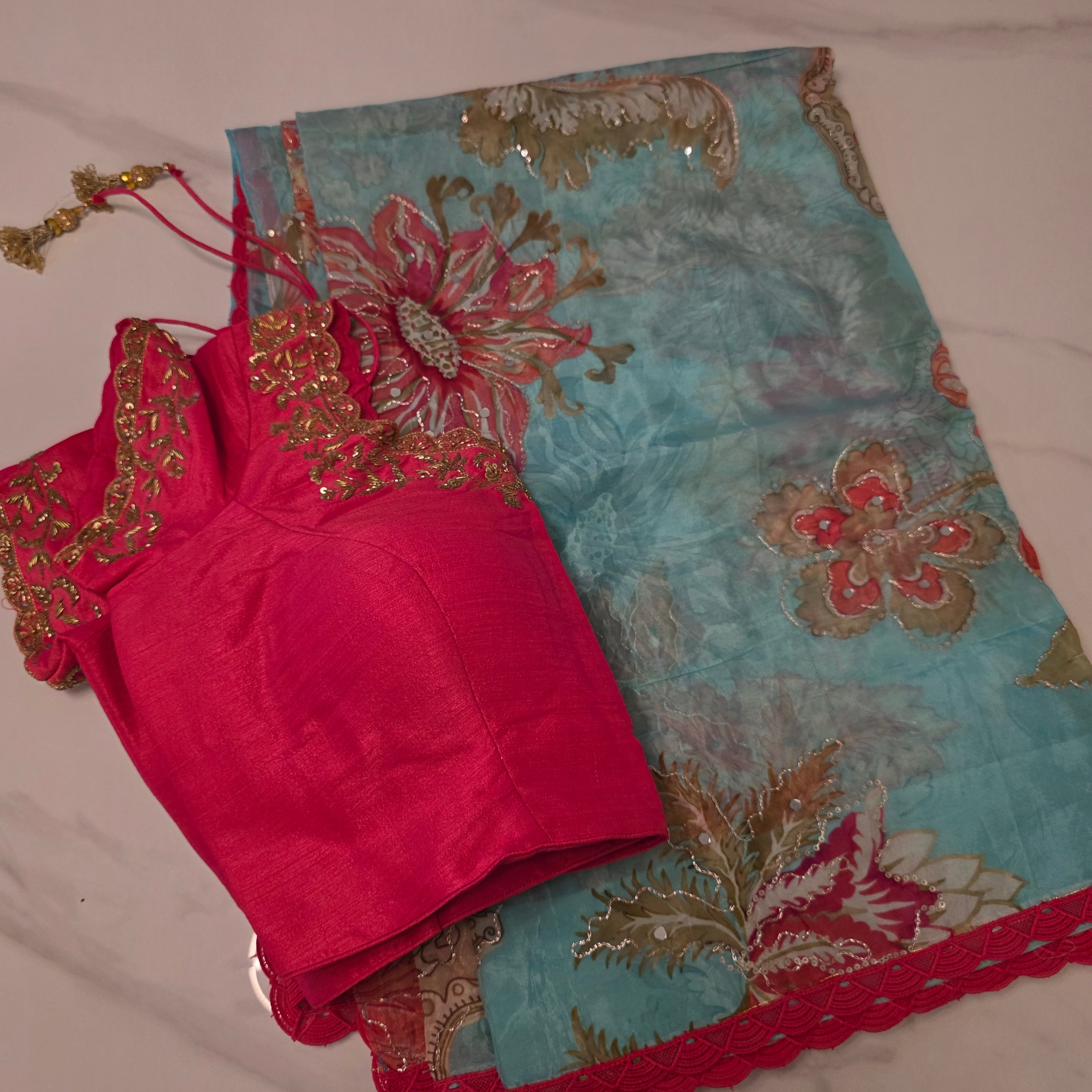 Light Blue Shiny Viscious Organza Saree paied with beautiful Maggam work Blouse