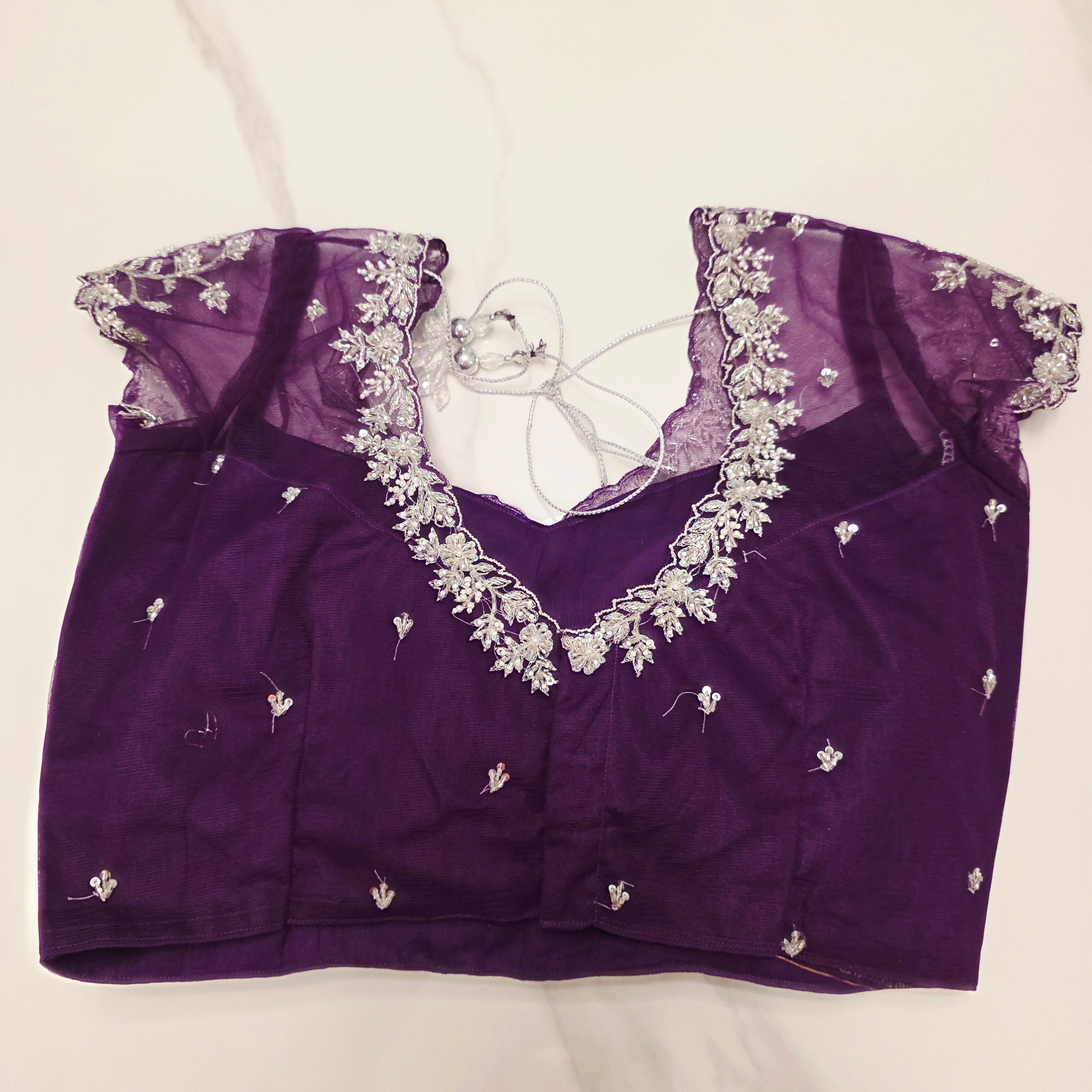 Violet Viscious Organza Stripes Saree With Leaf pattern mottifs paired with Net designer blouse