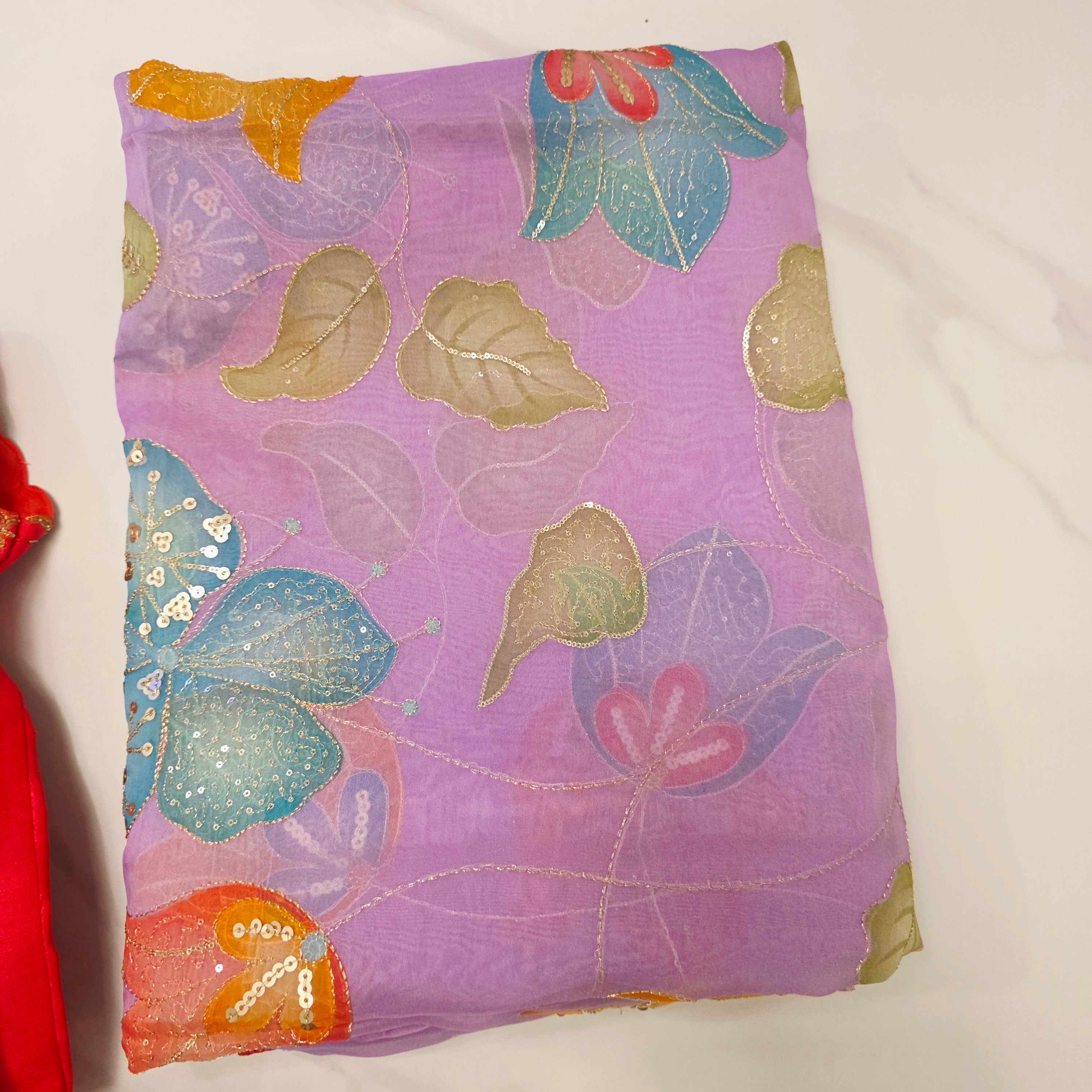 Purple Latest and Trendy Saree with Floral Hibiscus theme in paired with cute short sleeve blouse